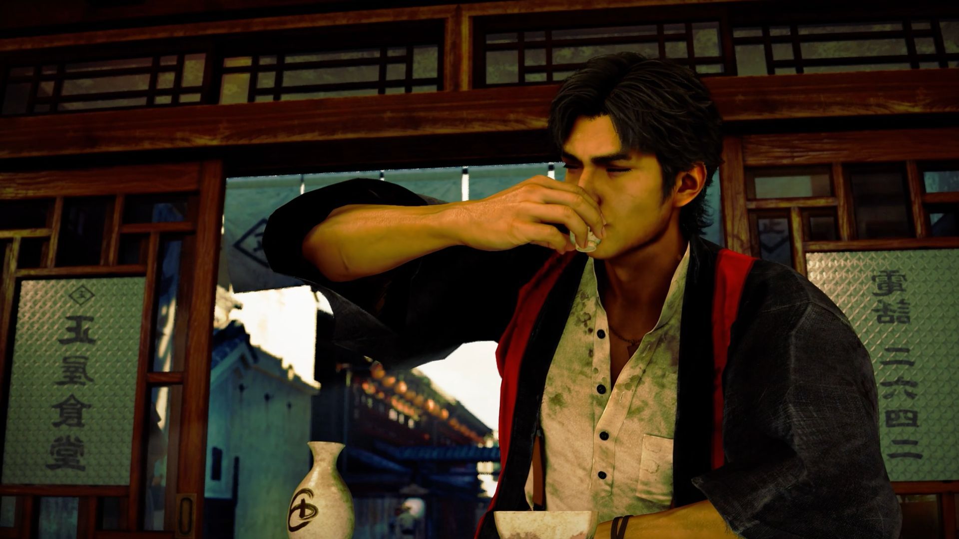 Makoto drinking sake in Stranger than Heaven.