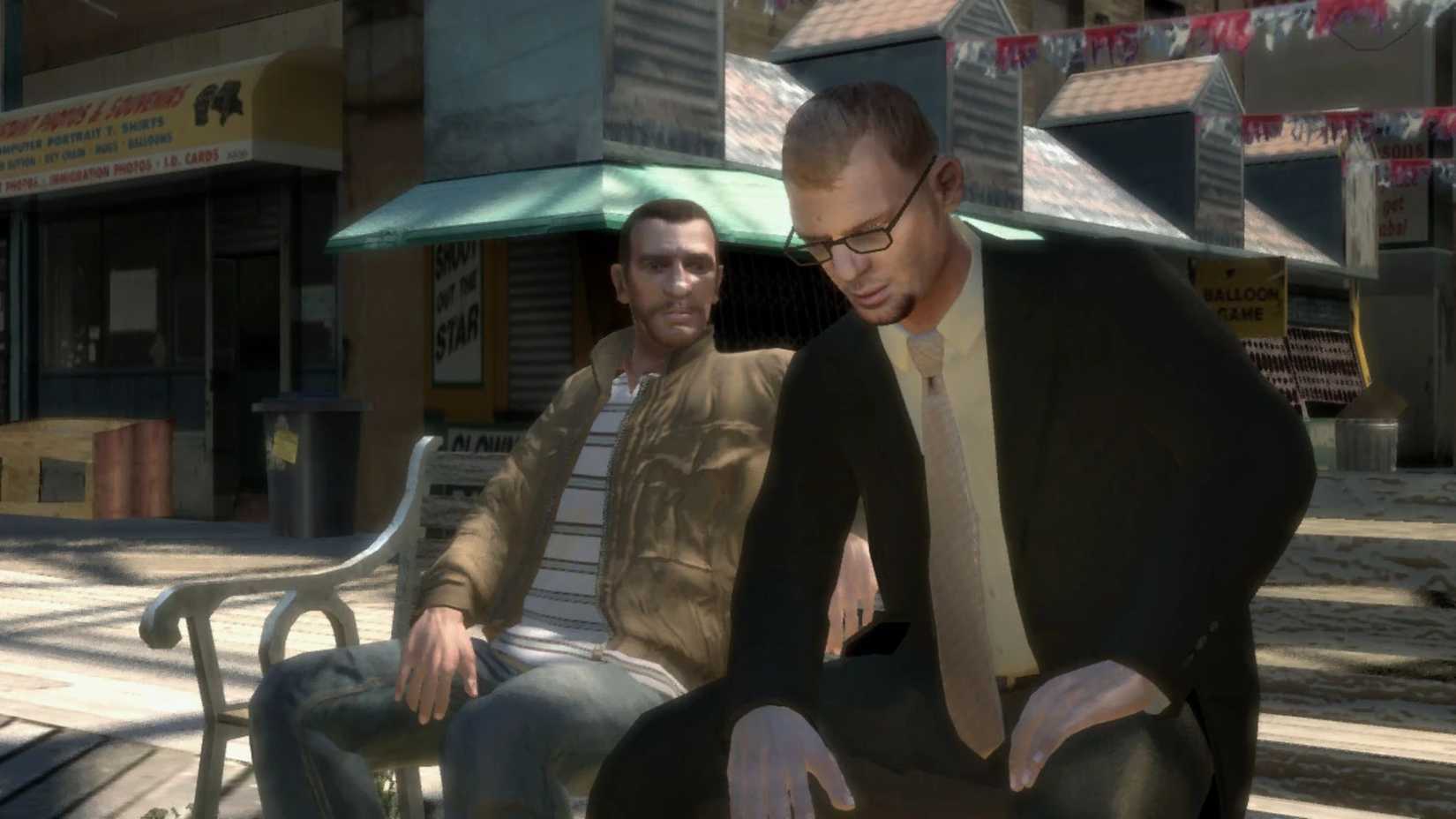 Niko sits with Dimitri in Grand Theft Auto 4.