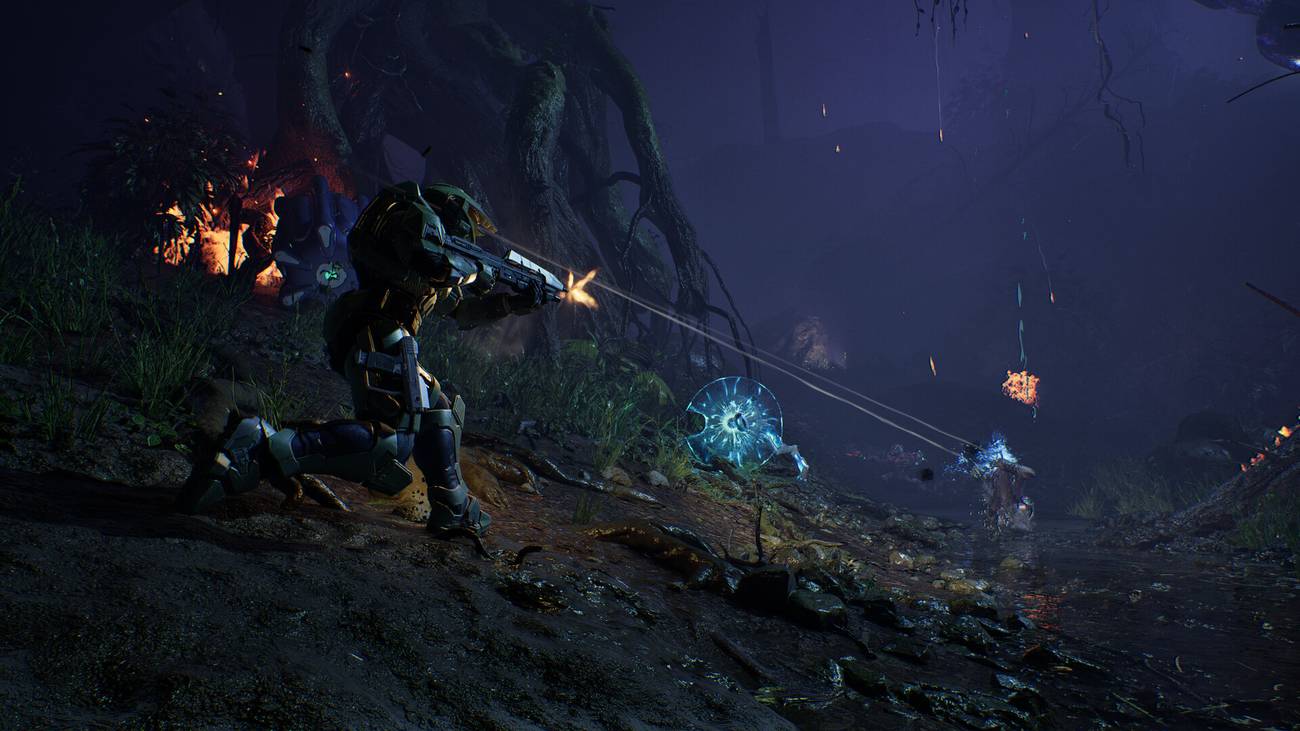 Master Chief fires an assault rifle in Halo: Campaign Evolved. 