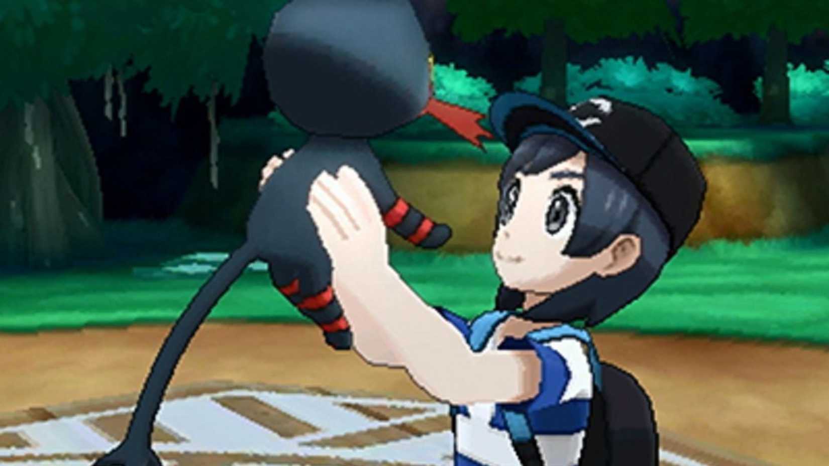 Character holding up Pokemon in Pokemon Sun and Moon.