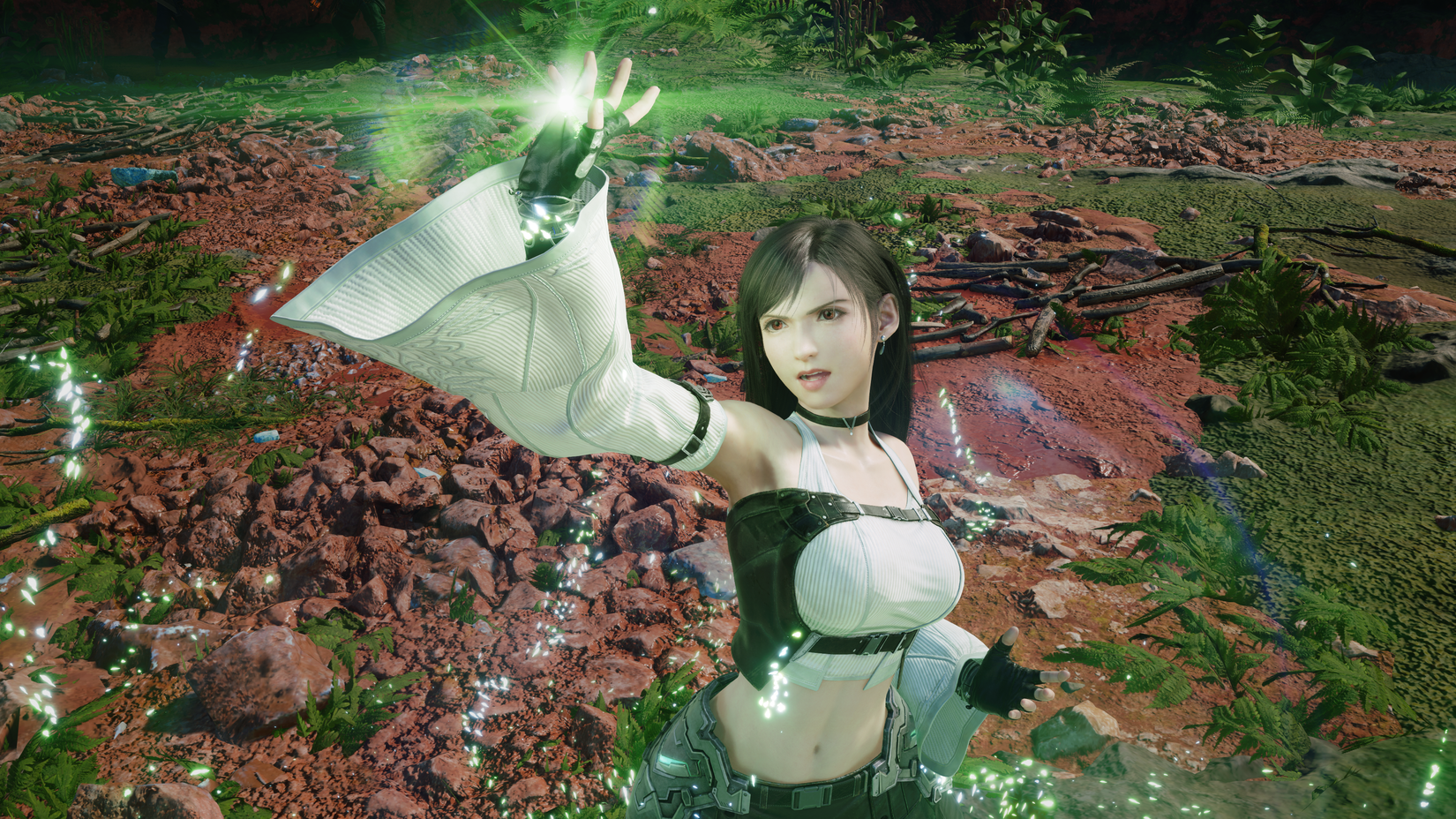 Tifa casting green magic in Final Fantasy 7 Revelation.
