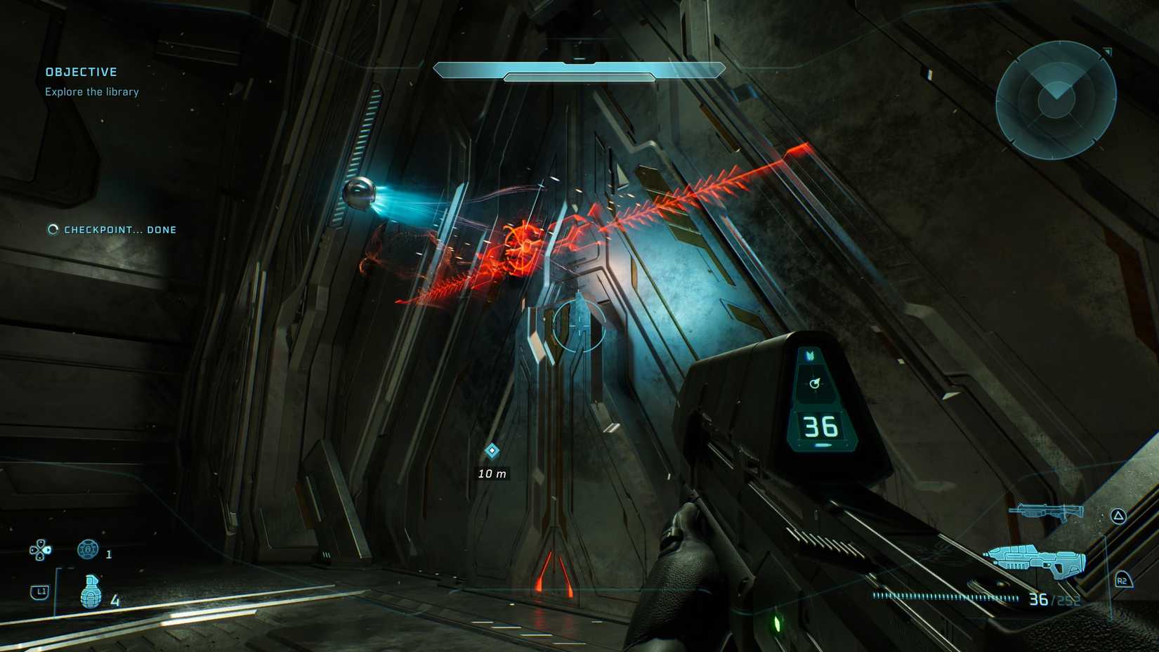 Master Chief waits for a door to open in Halo: Campaign Evolved. 