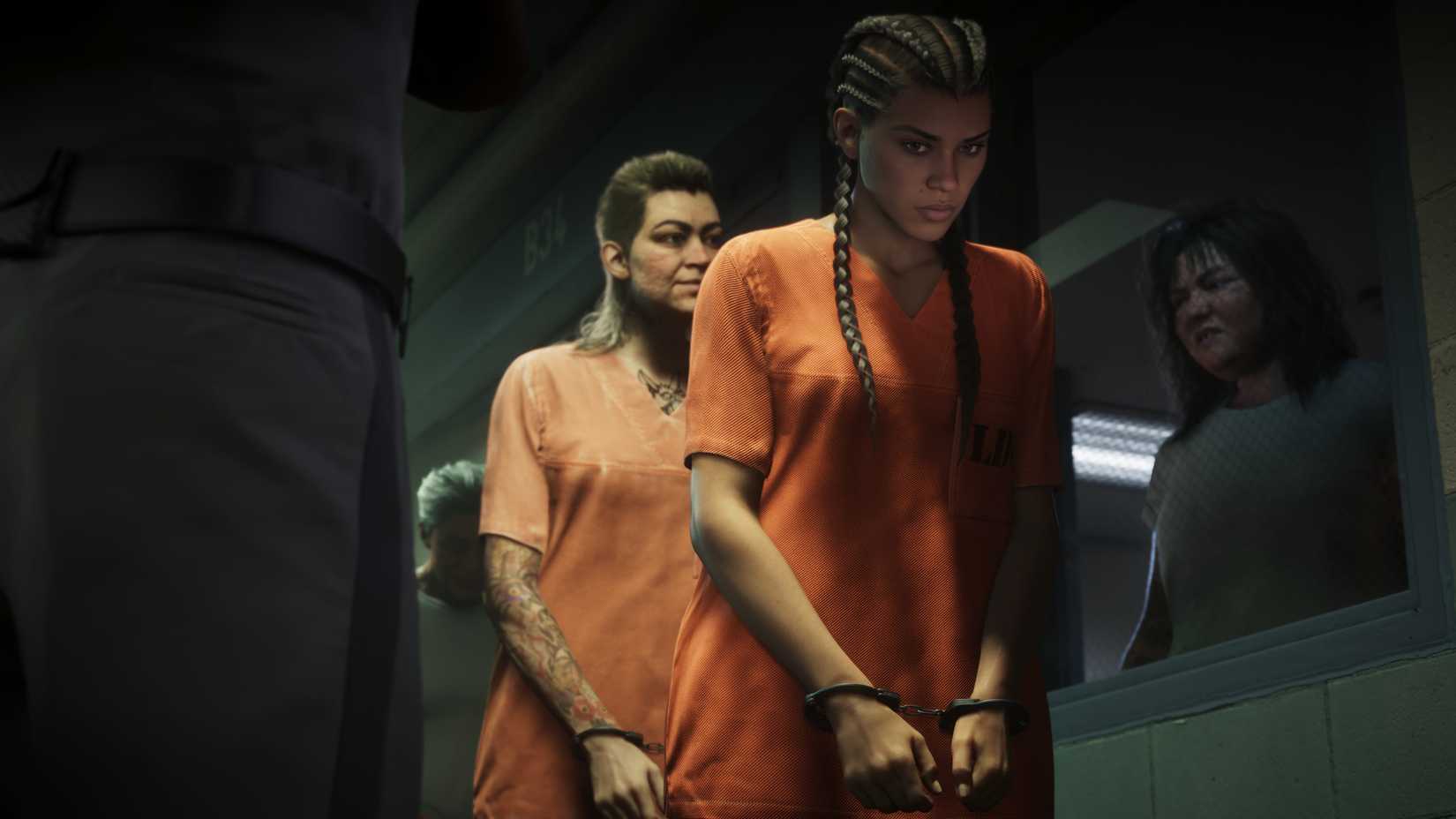 Lucia Caminos in an orange prison jumpsuit being walked through the corridors in Grand Theft Auto 6.