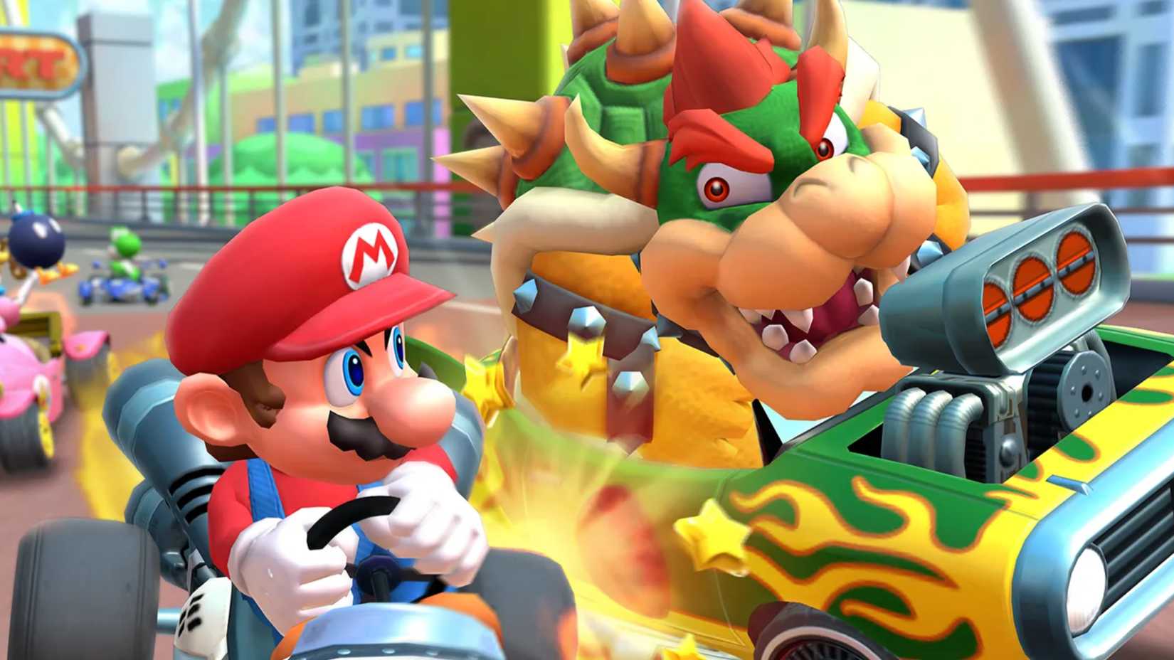 mario battling bowser in mario kart tour.