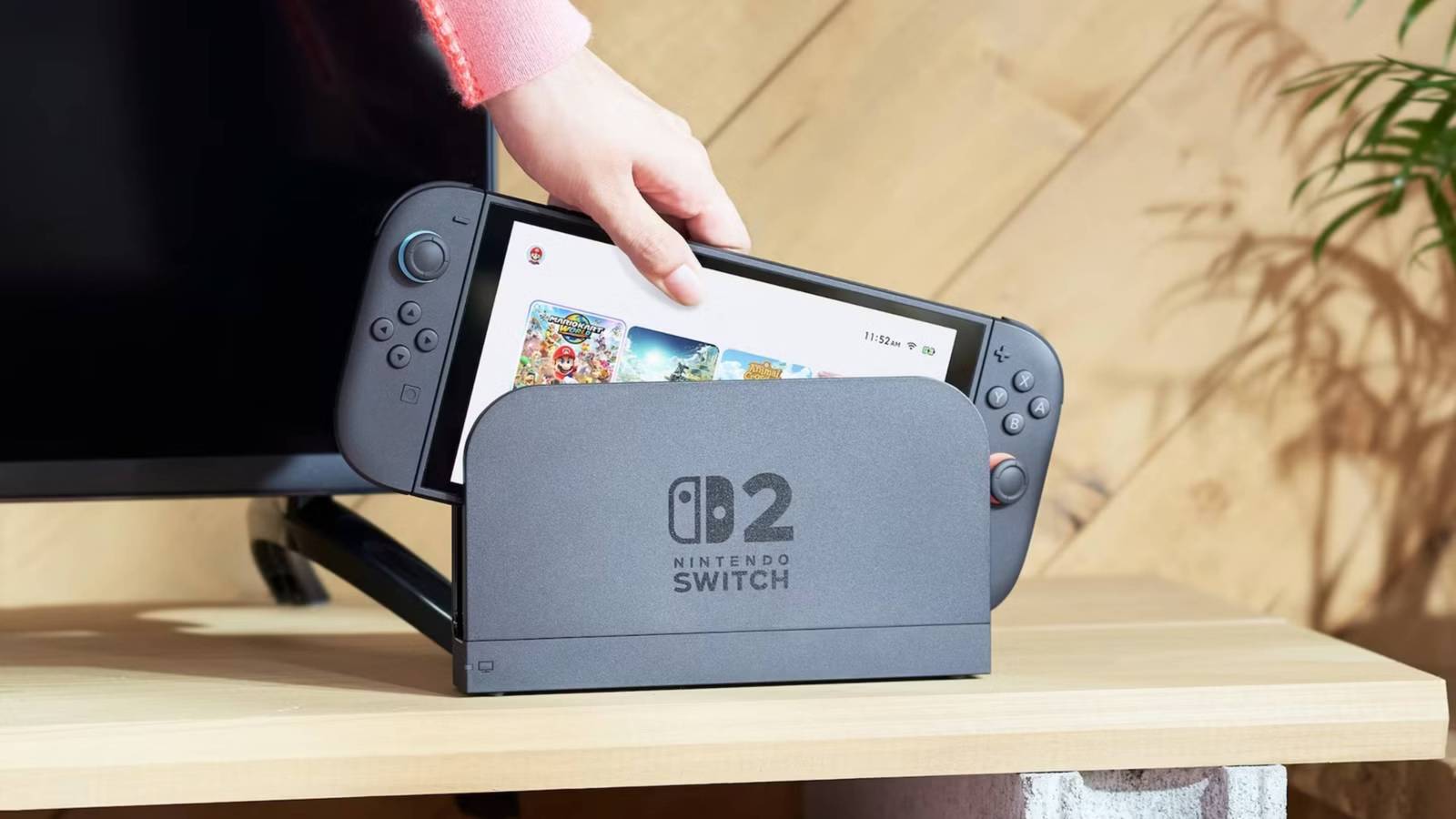 someone lifting a switch 2 out of its dock.