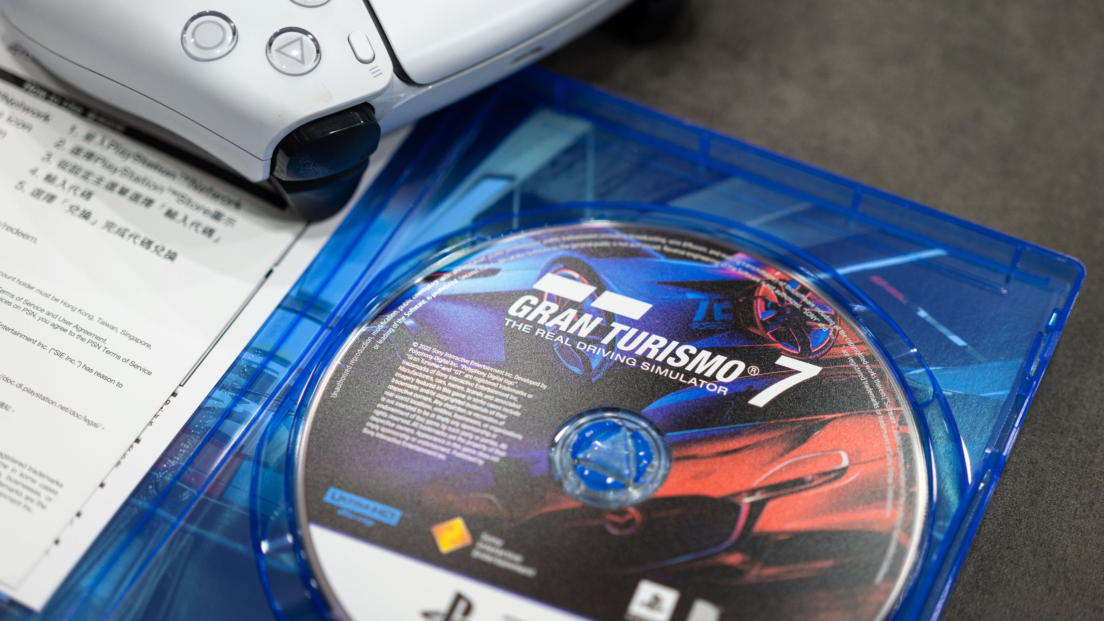 Gran Turismo 7 disc inside of a blu-ray box.