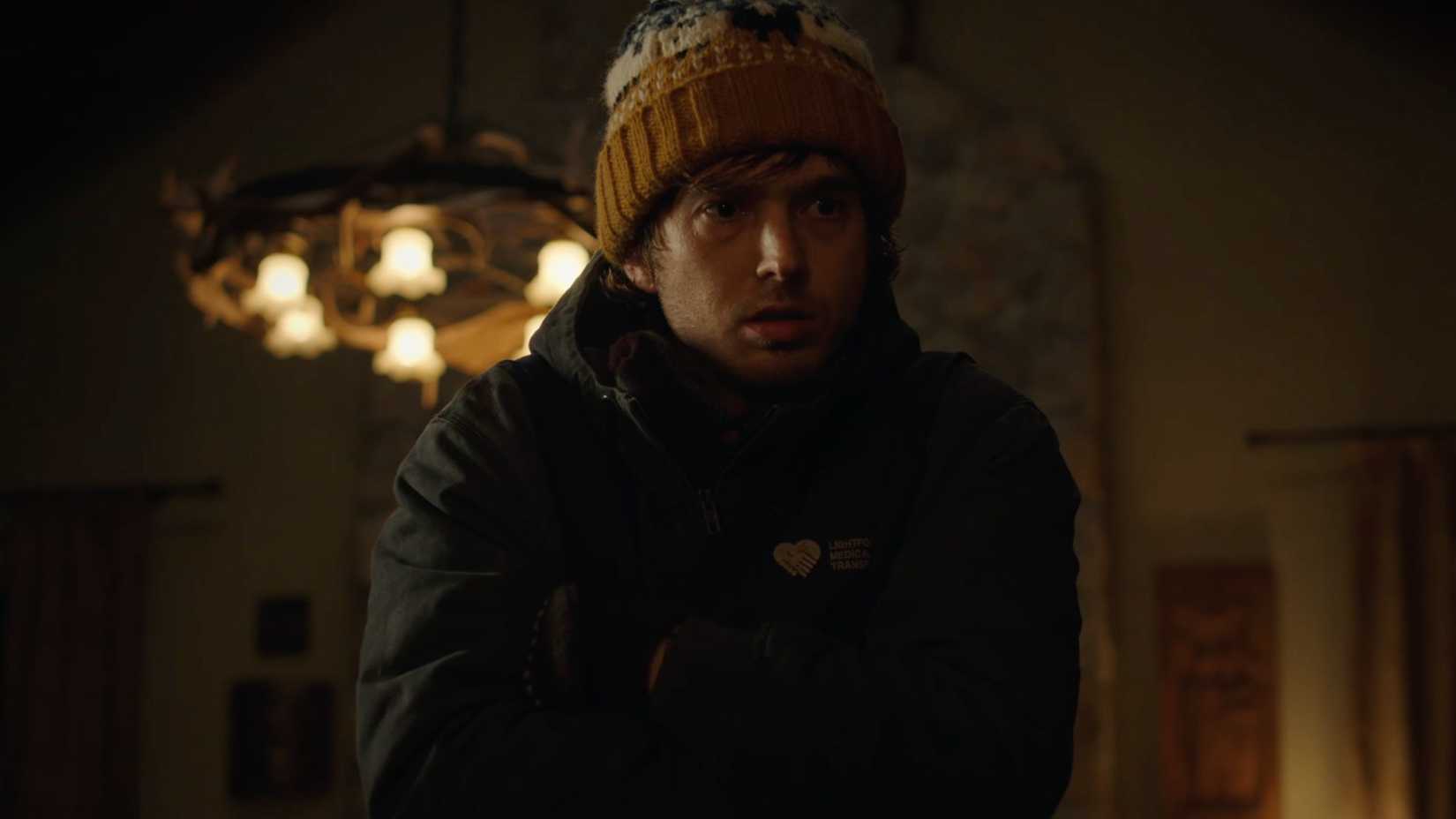 Resident Evil movie's protagonist grimacing in the new trailer.