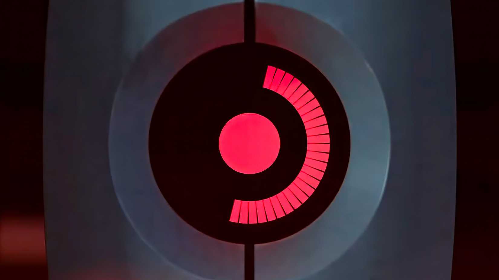 Steam Deck logo in the eye of a Portal turret.