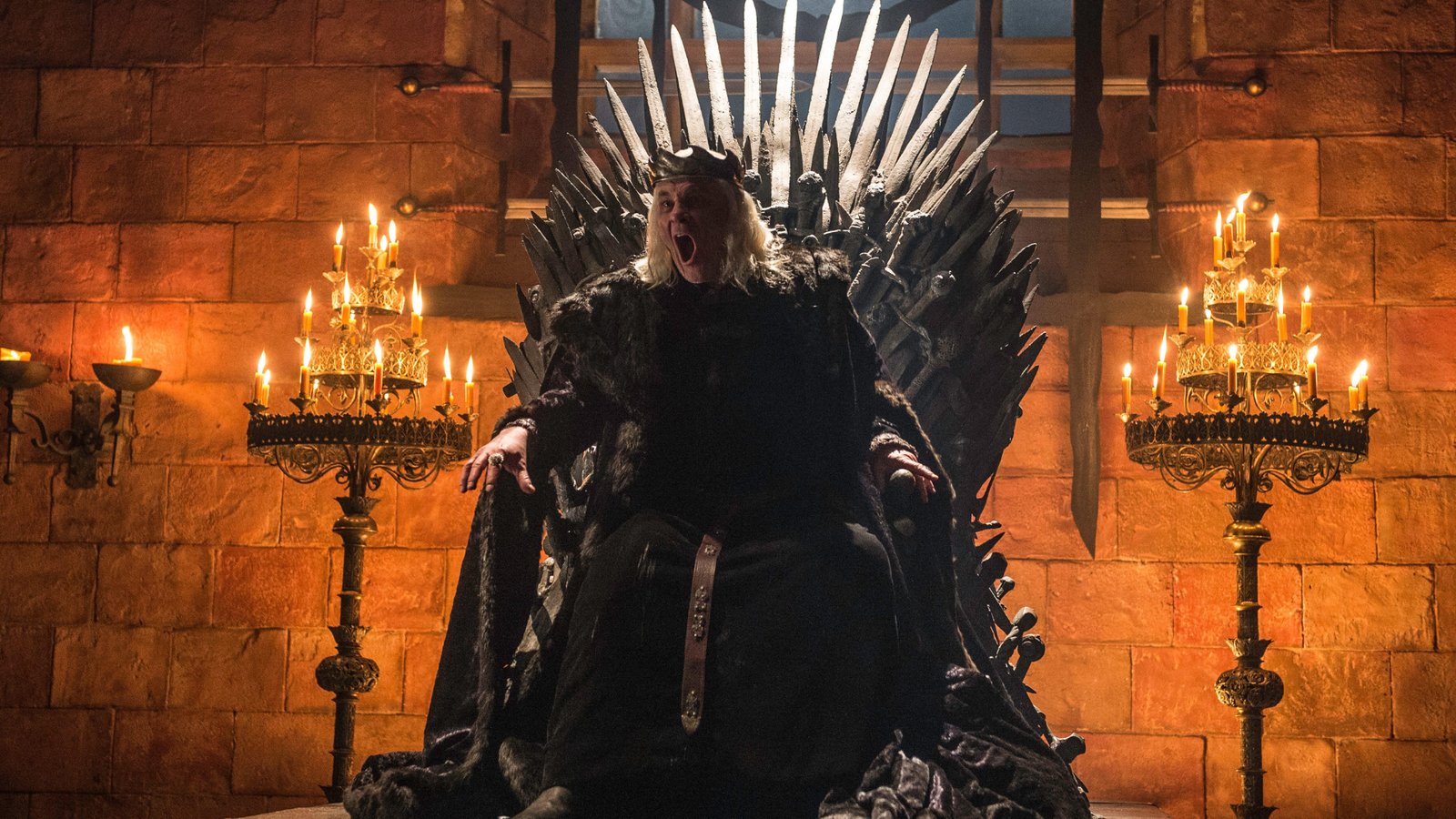 The Mad King in Game of Thrones, screaming from the Iron Throne.