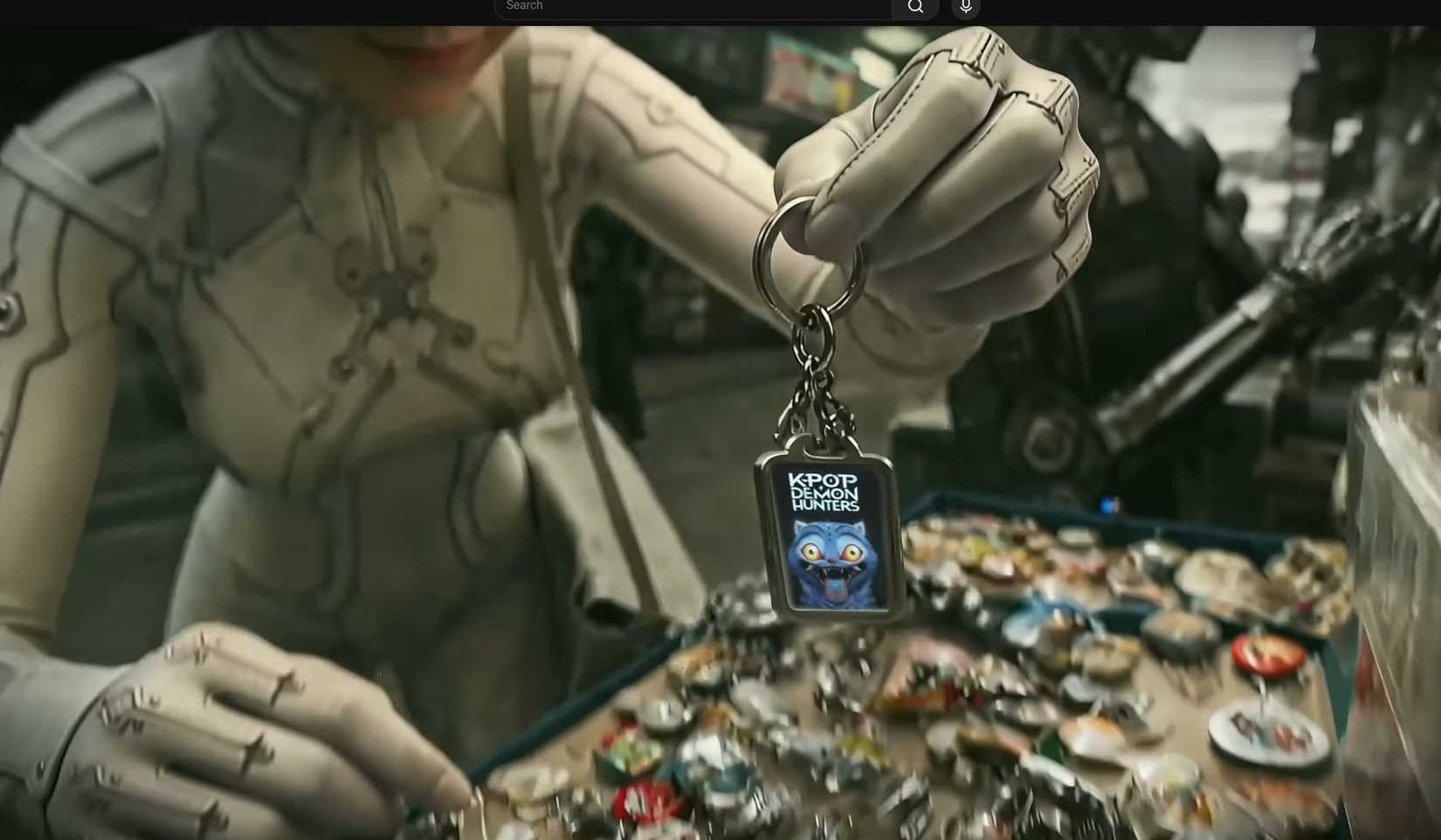 K-Pop Demon Hunters keychain in Stellar Blade AI music video. 