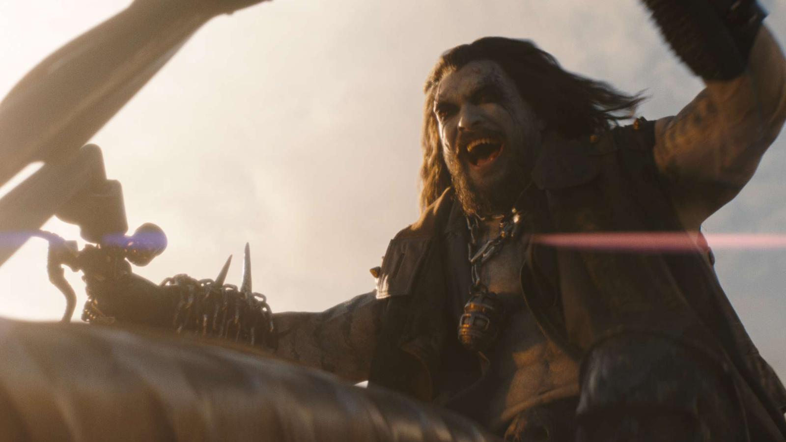 Lobo in the Supergirl movie. He is riding on a motorbike and cheering.