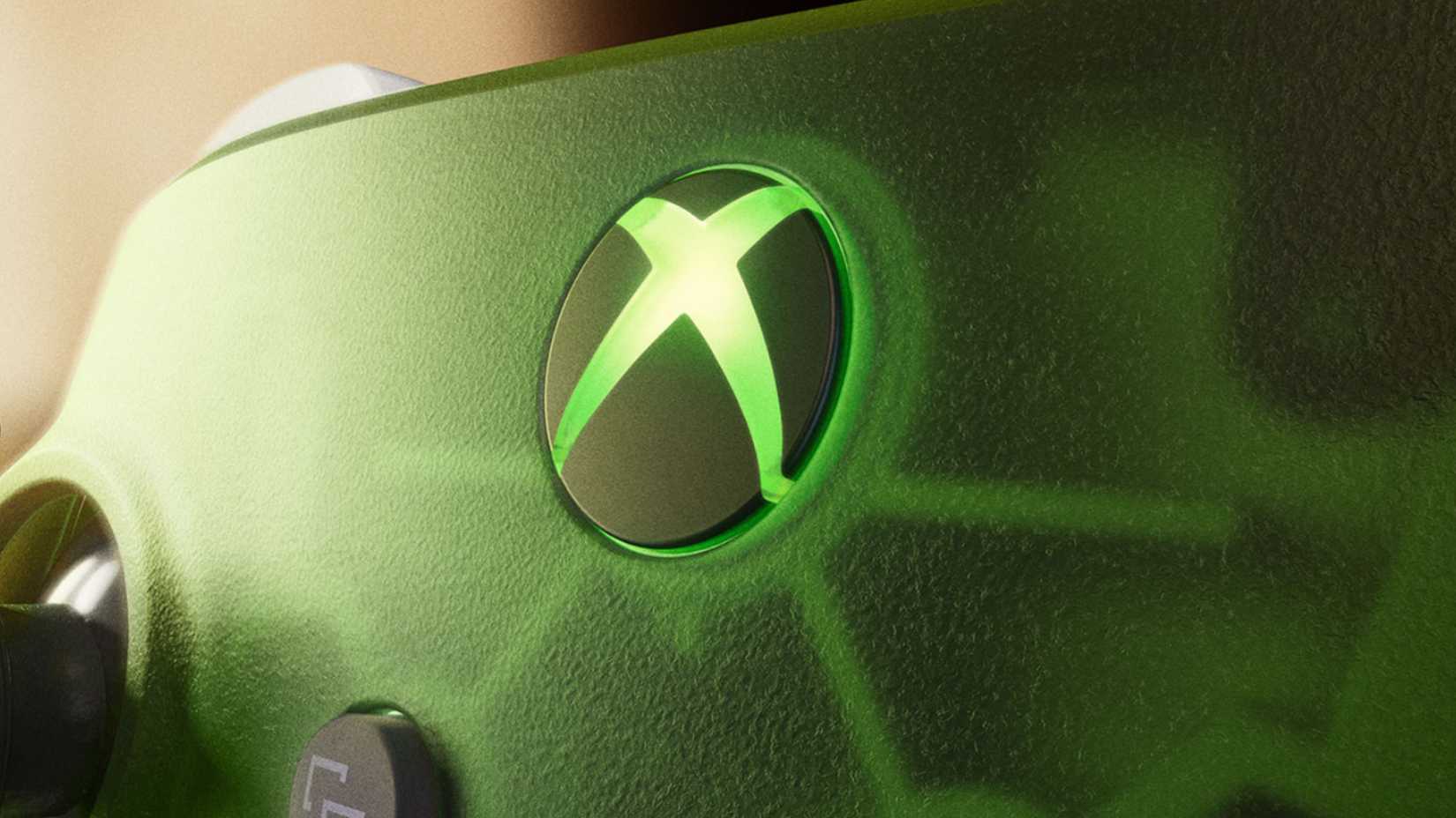 close up of the xbox logo on the series x25 controller.