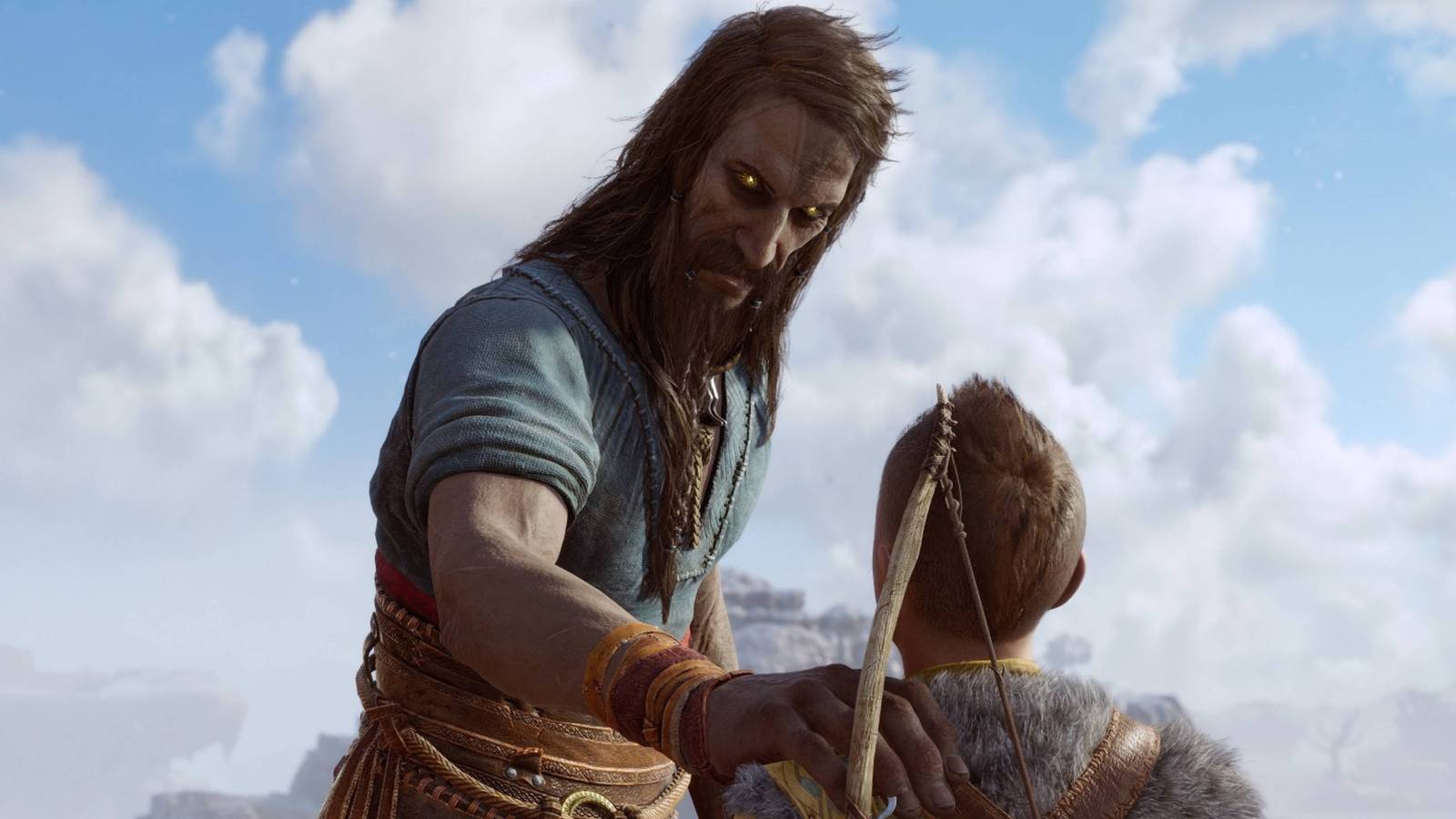 tyr with his hand on atreus's shoulder in god of war ragnarok.