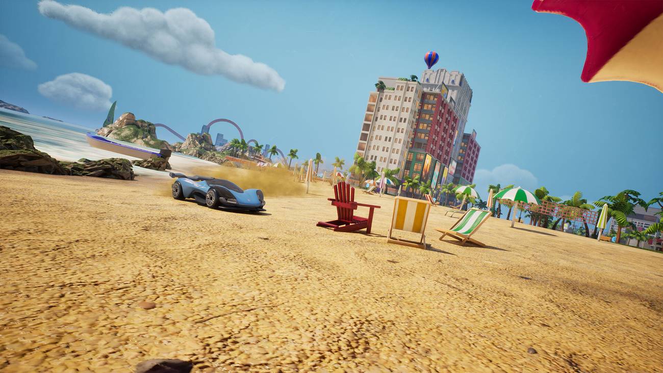A car drifts on a sandy beach in Hot Wheels: Infinite Rush. 