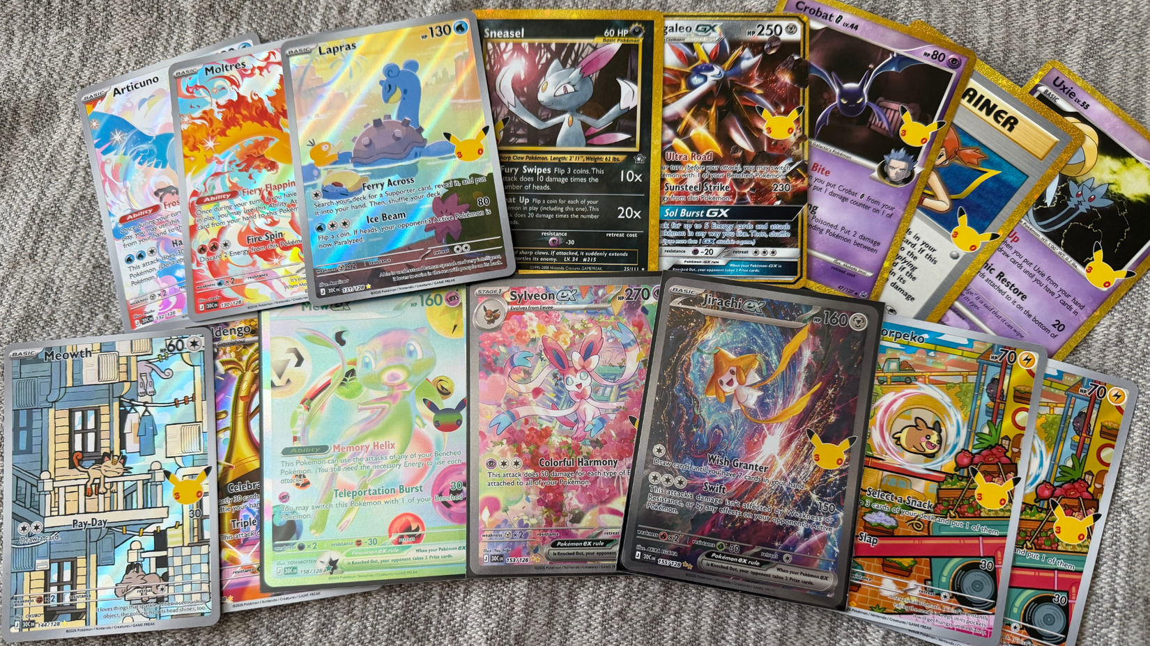 a selection of pulls from the Pokemon 30th Anniversary expansion.