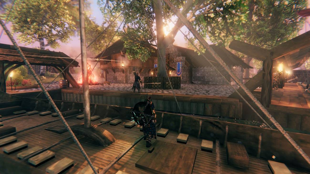 Characters gathered around in Valheim's forest. (1)