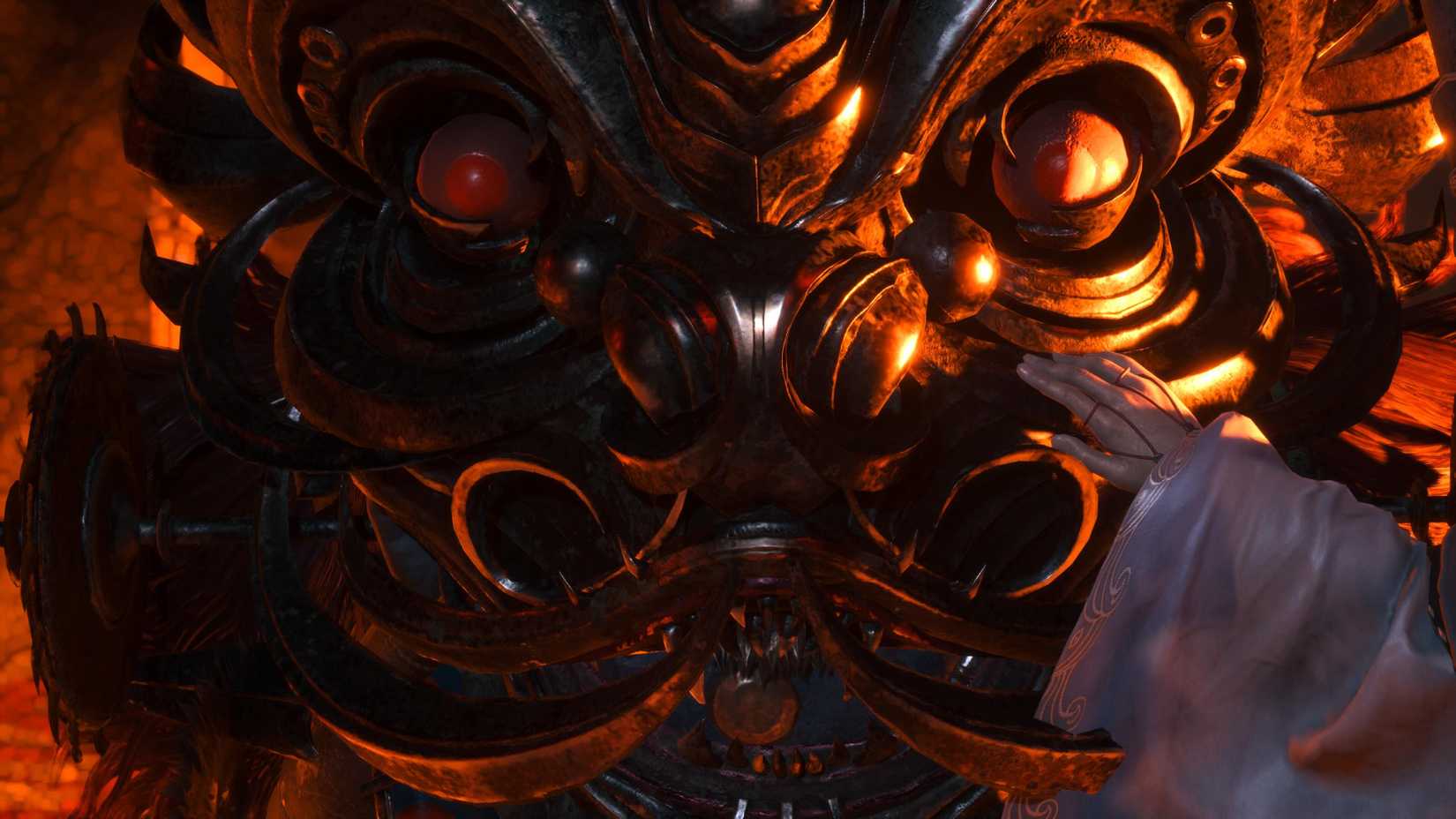 Una mano accarezza il muso di un leone in Phantom Blade Zero.