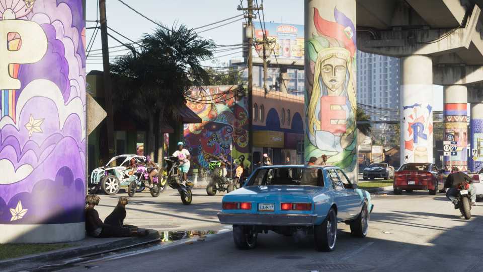 A car driving through a vibrant street in GTA 6.