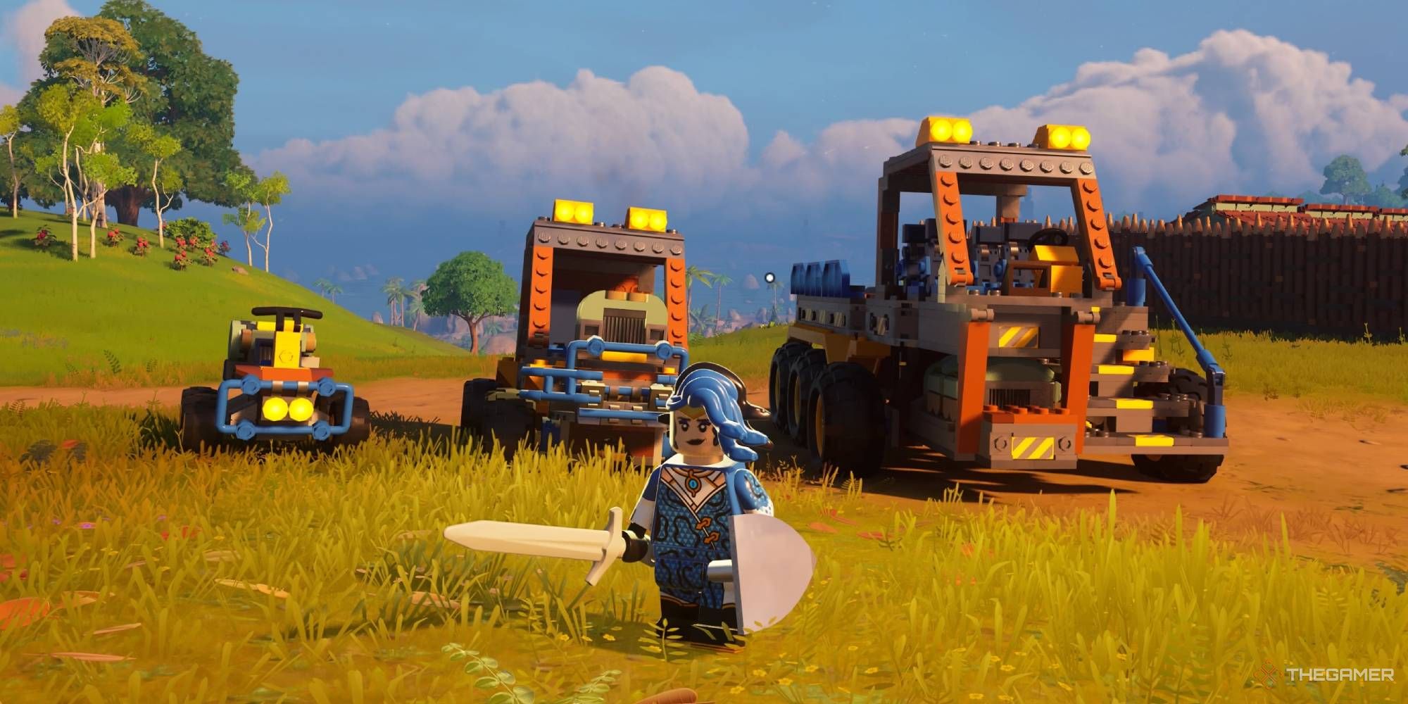 Standing in front of the Mechanical Mayhem Vehicles: Speeder, Offroader, Hauler, in Lego Fortnite