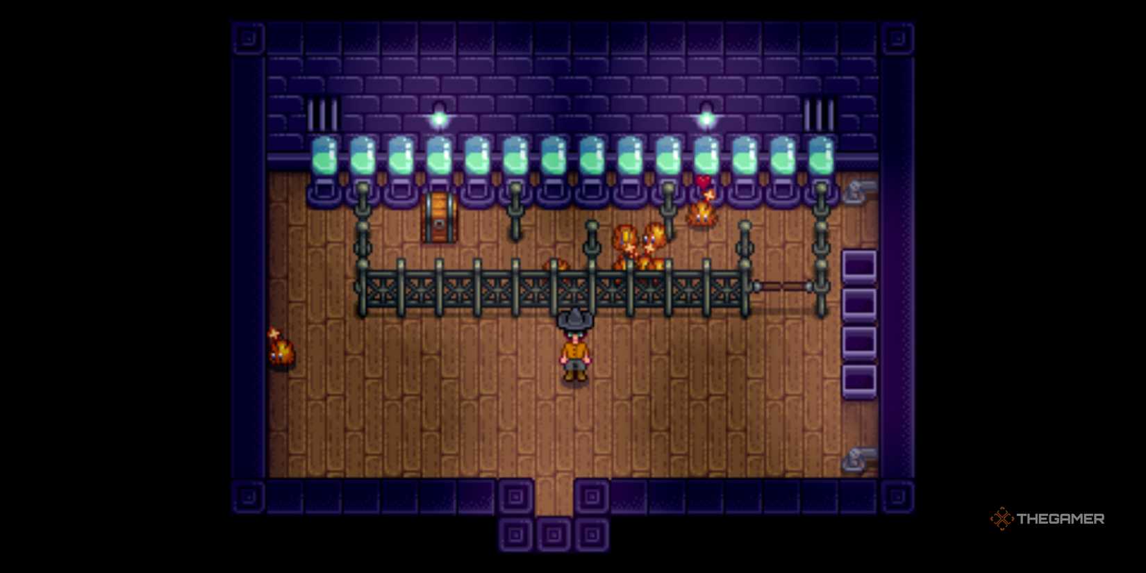 A staggered pathway in a Slime Hutch full of tiger slimes guarding a chest in Stardew Valley