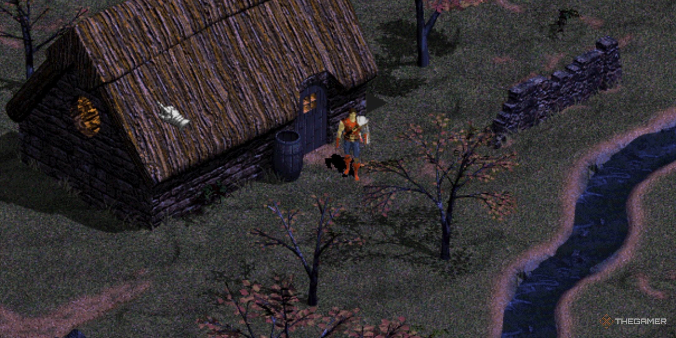 Original Diablo player standing by a river in front of a brick house with a thatch roof