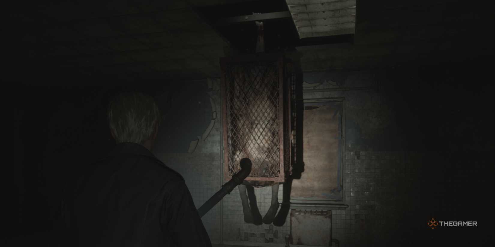 Silent Hill 2 - James holding a pipe and approaching the Flesh Lip boss who's suspended from the ceiling in a cage.