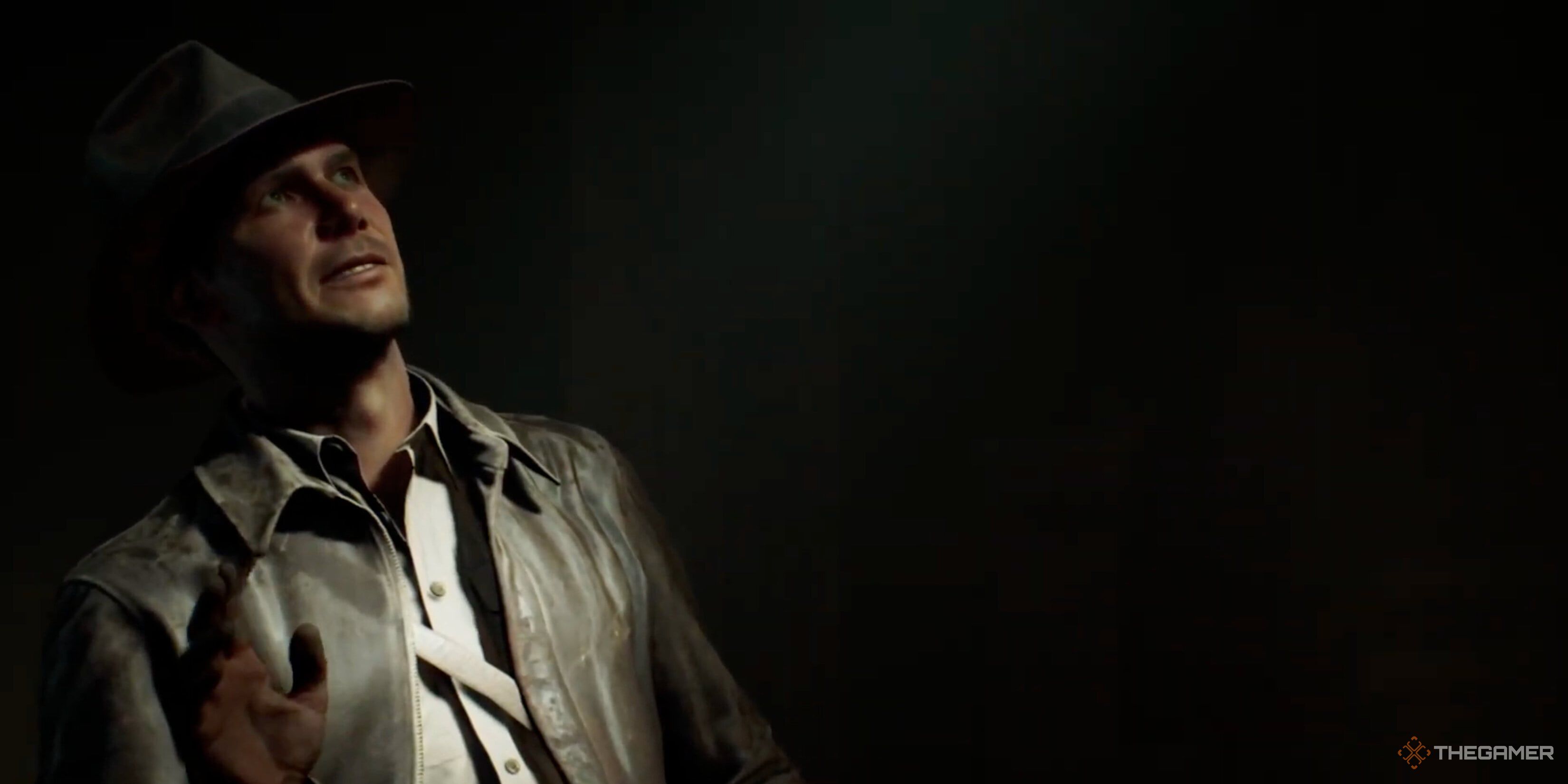 Indy looking up a light in Indiana Jones and the Great Circle.