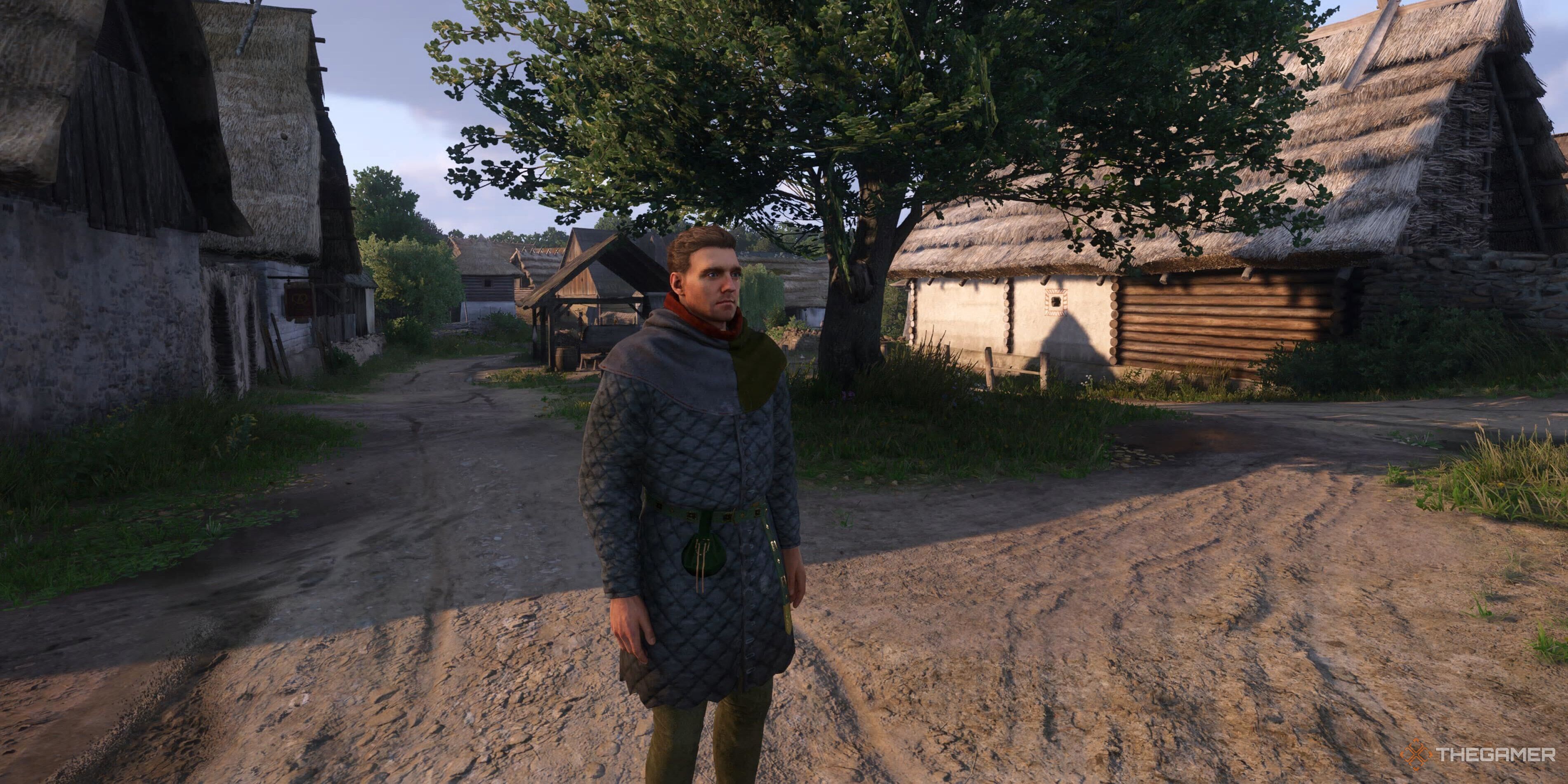 Henry in front of a tree in Kingdom Come: Deliverance 2.