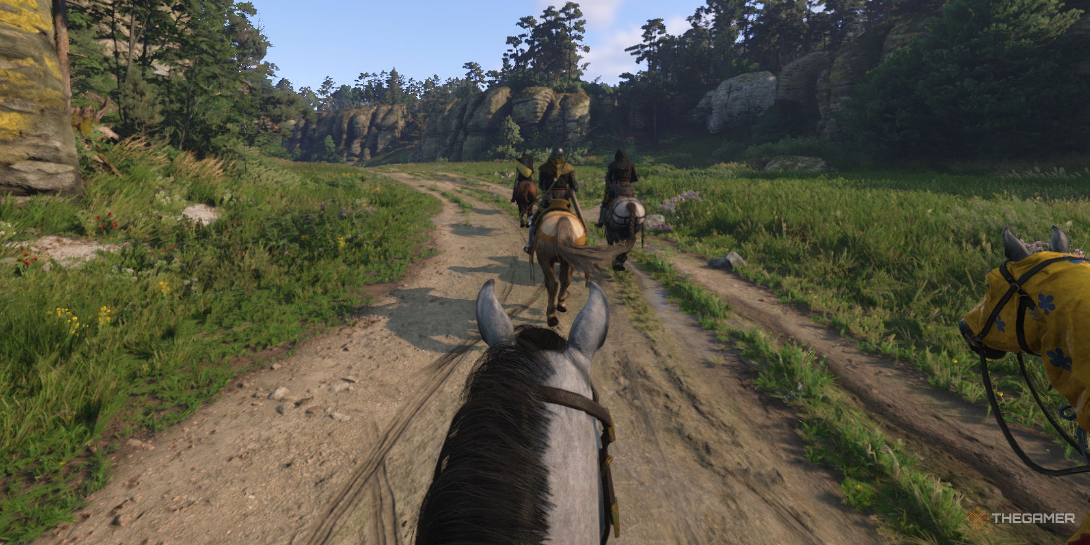 An image of several riders on horseback in Kingdom Come: Deliverance 2.