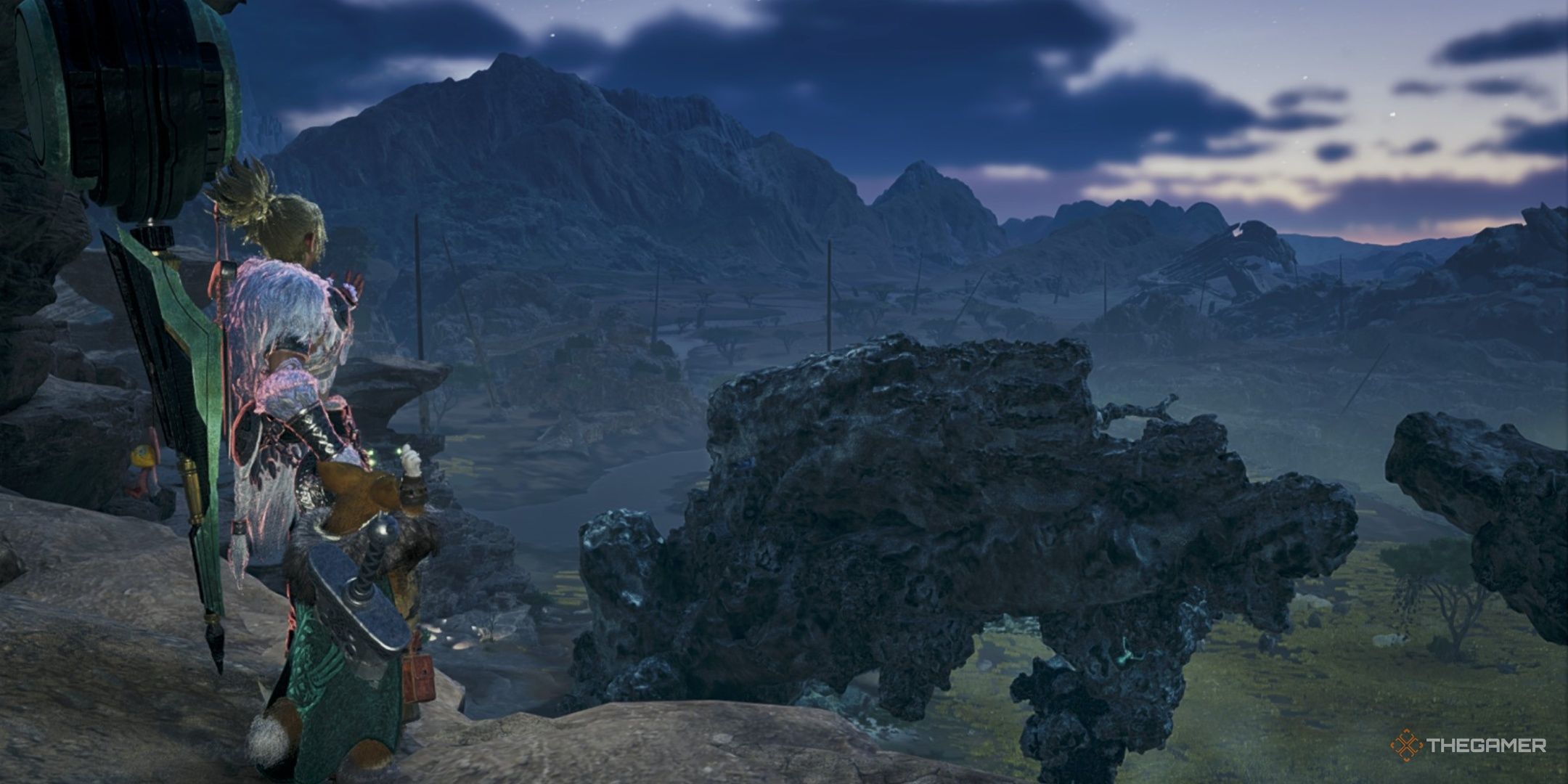 A hunter and their palico looking out over the windward plains at night in monster hunter wilds.