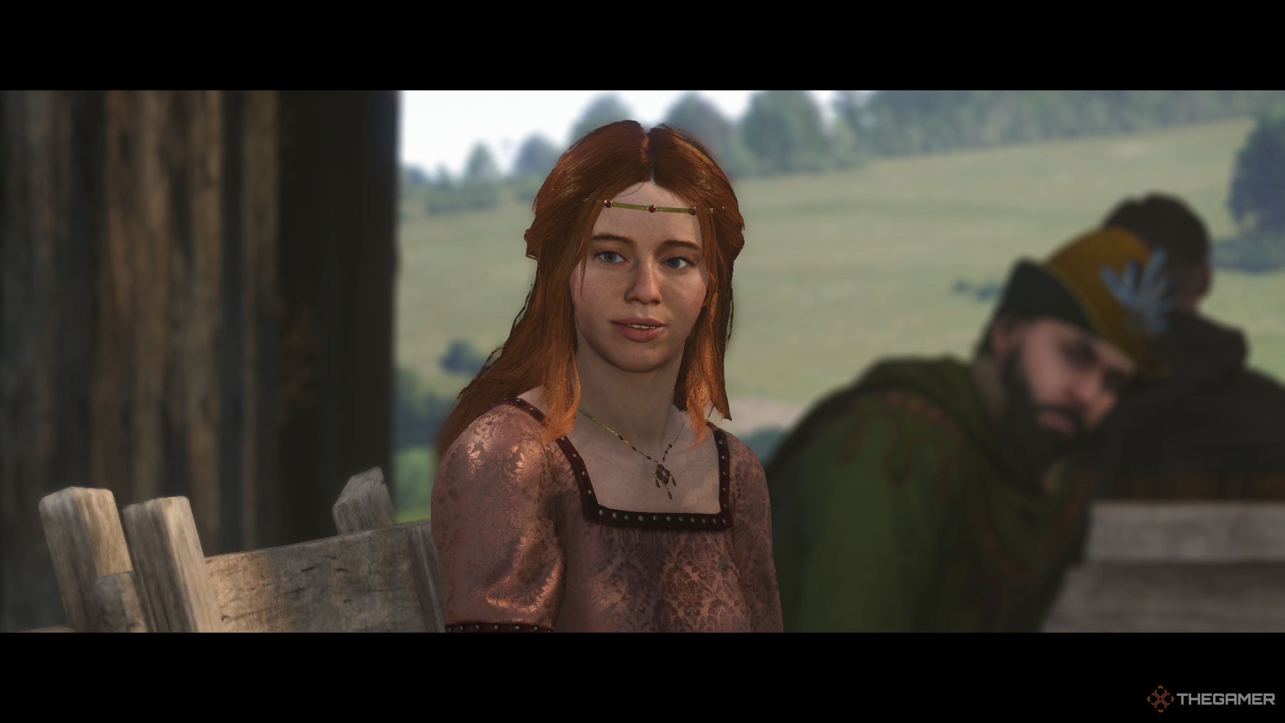 In-game cutscene featuring Rosa Ruthard sitting in a cart.