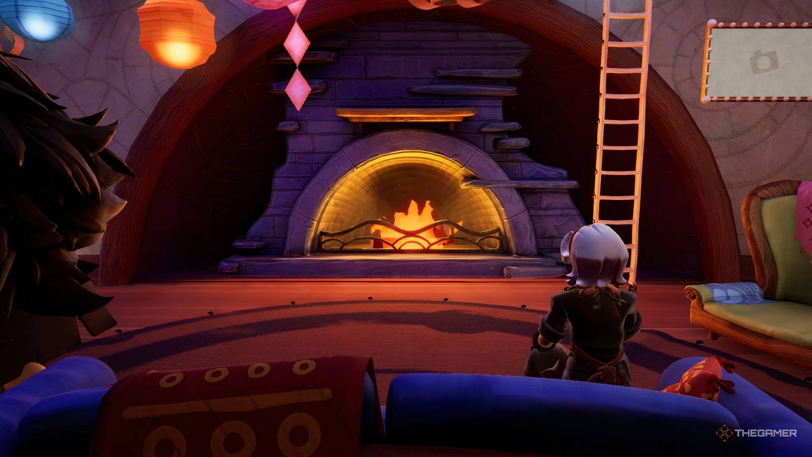 Alta enjoys a cup of tea in front of the fireplace at Wanderstop.