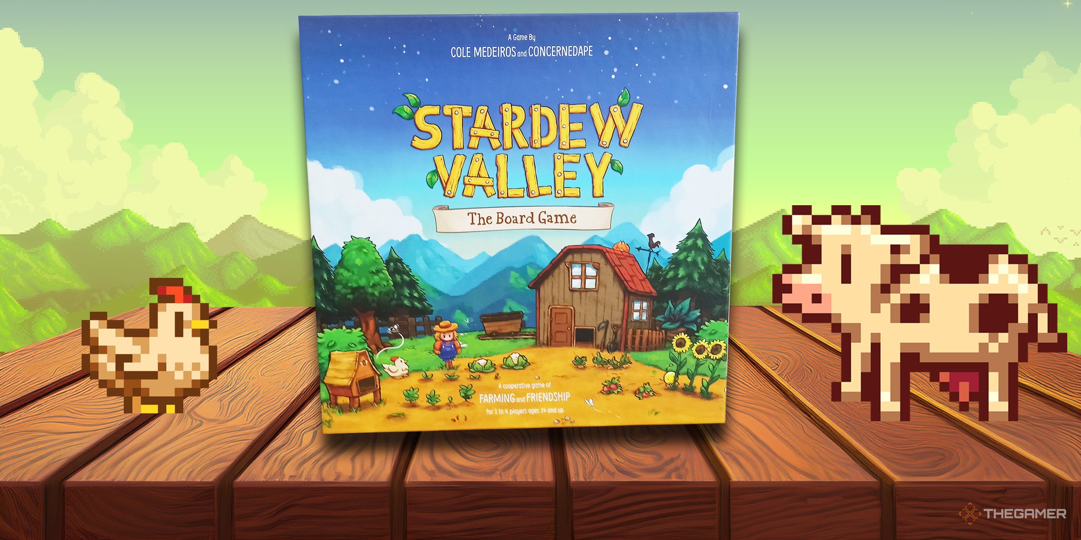 The Stardew Valley board game box is on a picnic table.