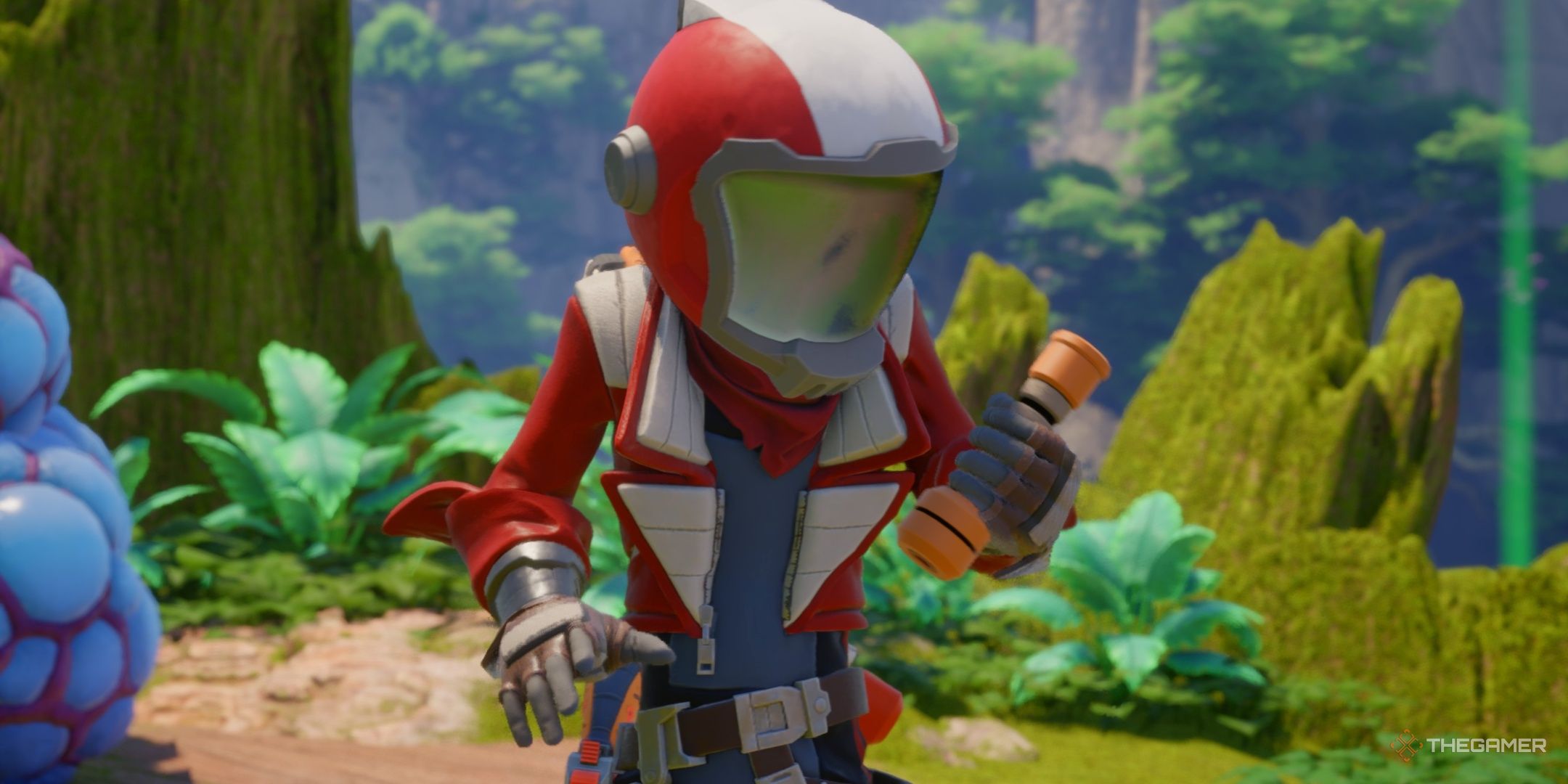 The player in a red outfit holding the lasso whip in revenge of the savage planet.