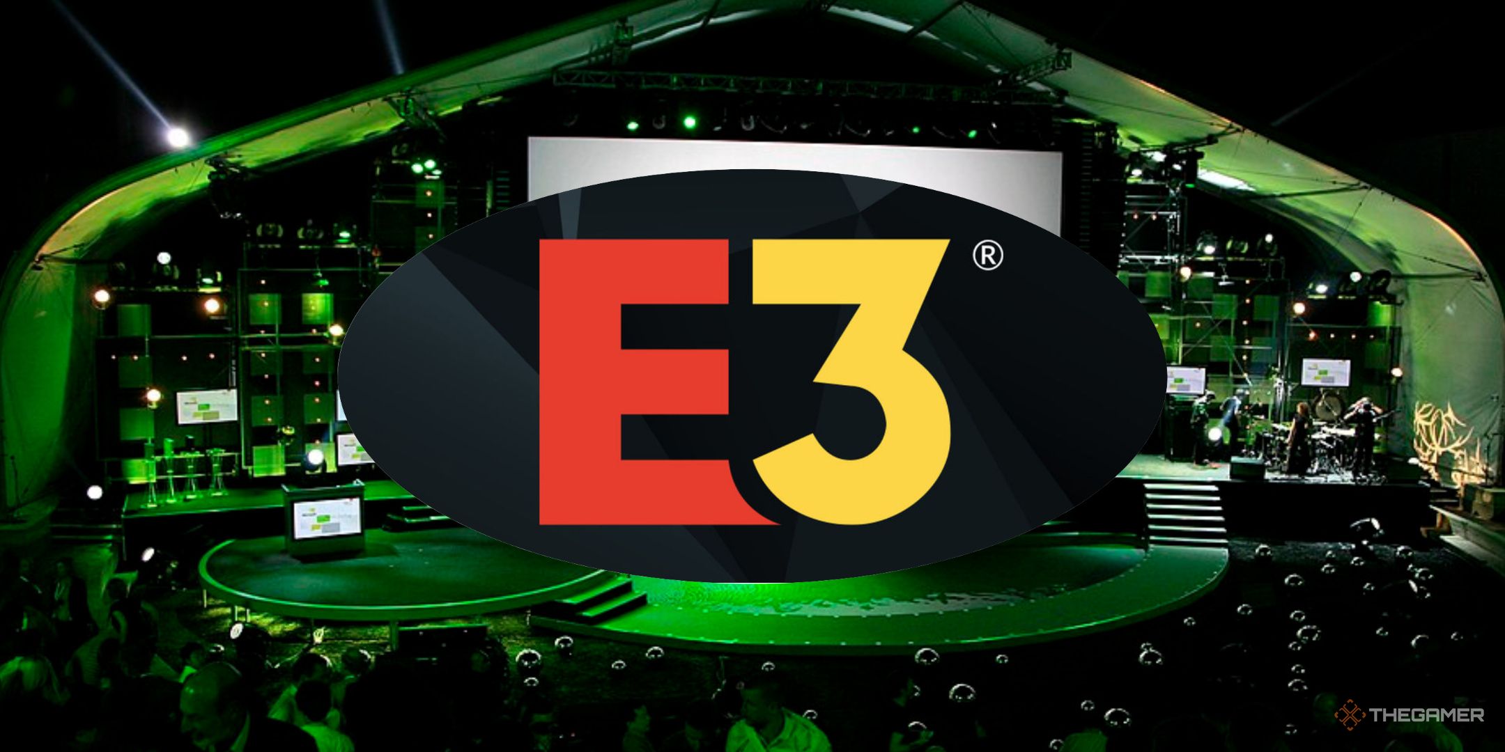 The E3 logo at the front with one of Xbox E3 stages in the background.