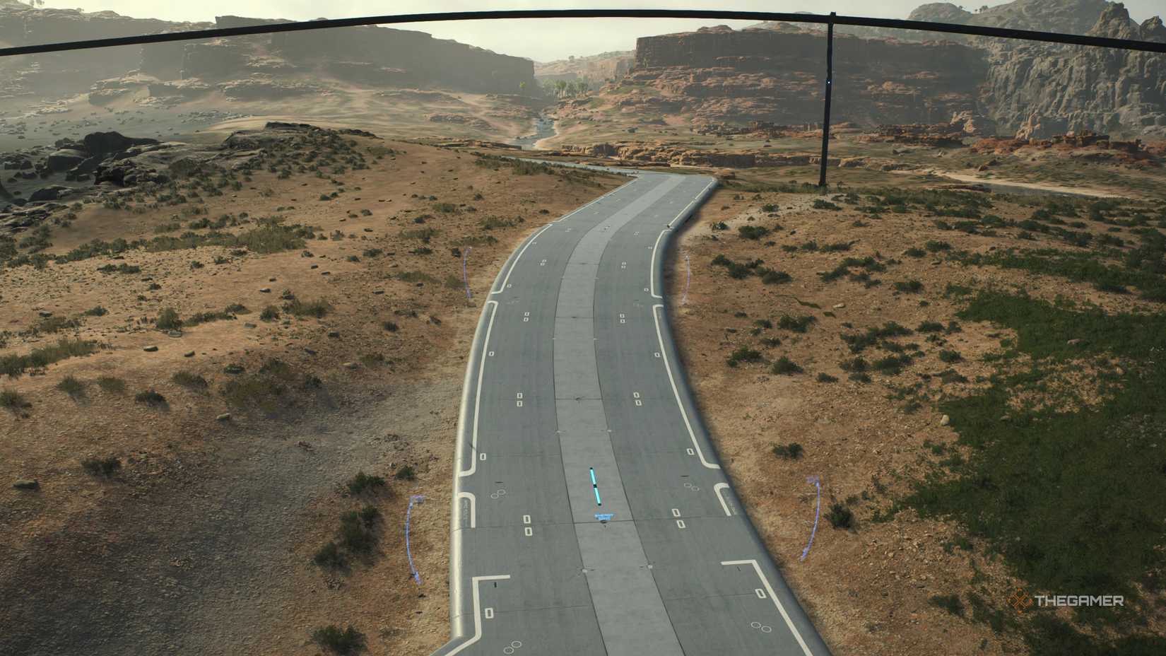 A completed road in death stranding 2: on the beach.