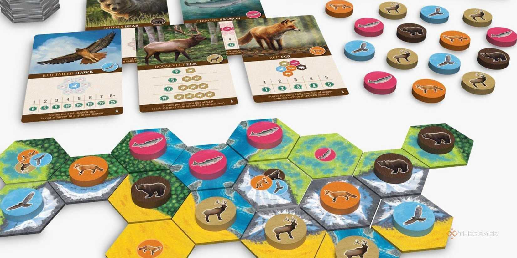 Cascadia tiles and cards in a white background. - 1