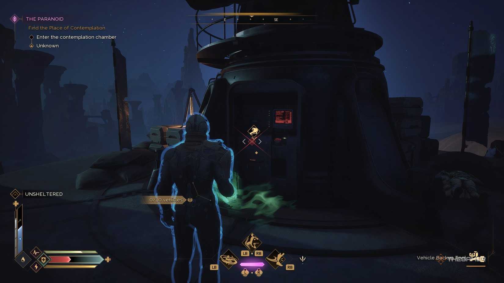 The player interacts with a tower base in Dune: Awakening. 