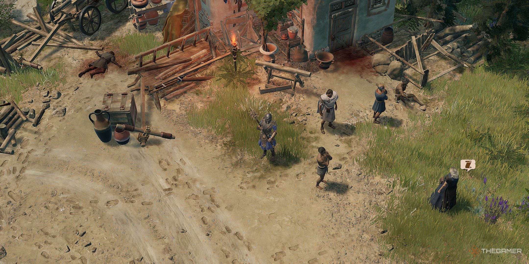 Standing with the free villagers in Cages in the Dark in Titan Quest 2.