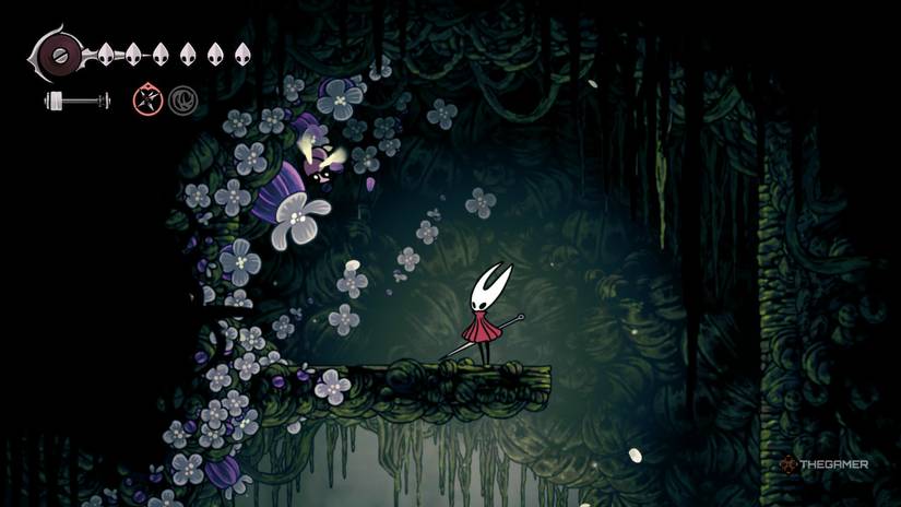 The horn finds the heart of the fifth pollip, which is watched by wooden wasps in hollow knights: silksong.