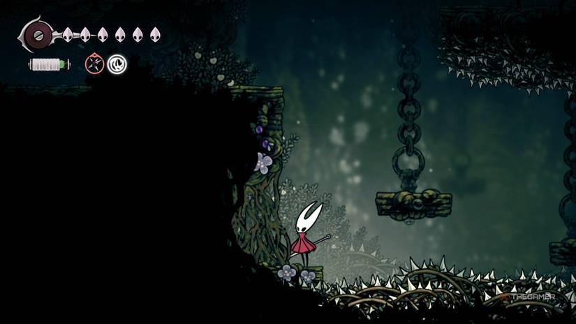 The horn finds a vine wall that blocks the final pollip's heart into hollow knights: silksong.