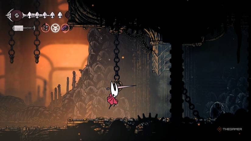 Hornet uses Clawline to open a door into the deeper depths of the Deep Docks in Hollow Knight: Silksong.