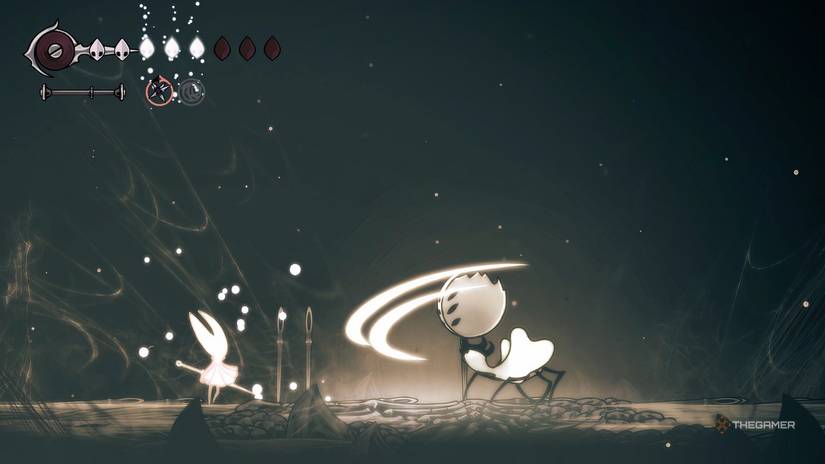 Hornet heals just before being struck by the First Sinner's Frenzied Strikes in Hollow Knight: Silksong.