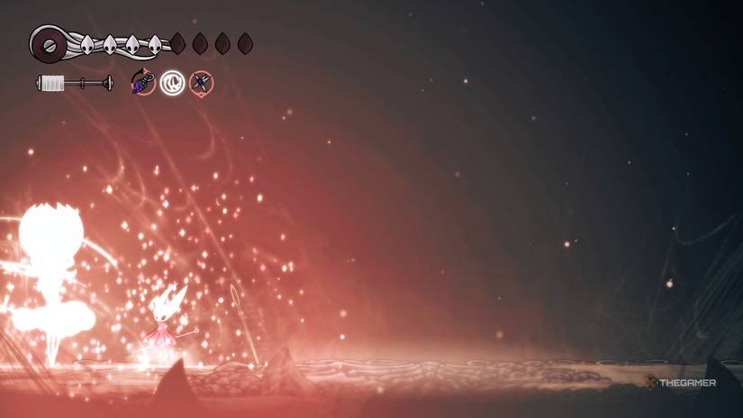 Hornet uses her heal with the Witch's Crest and Claw Mirror to deal massive damage against the First Sinner in Hollow Knight: Silksong.