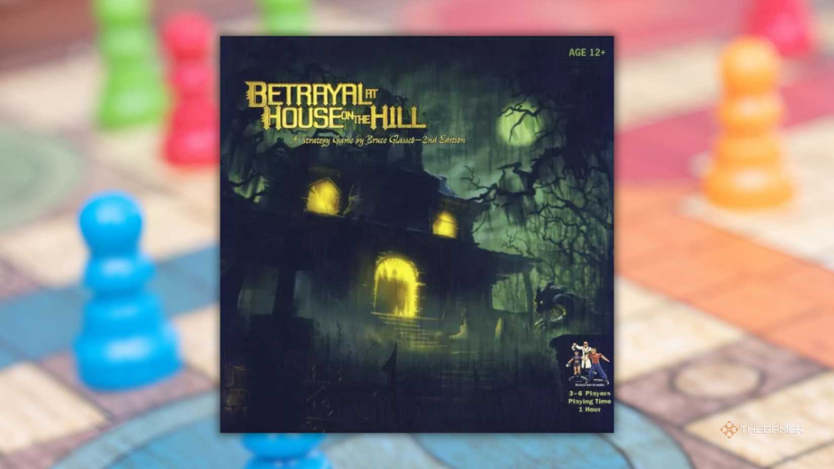 Color board game behind the cover of Betrayal at House on the Hill.