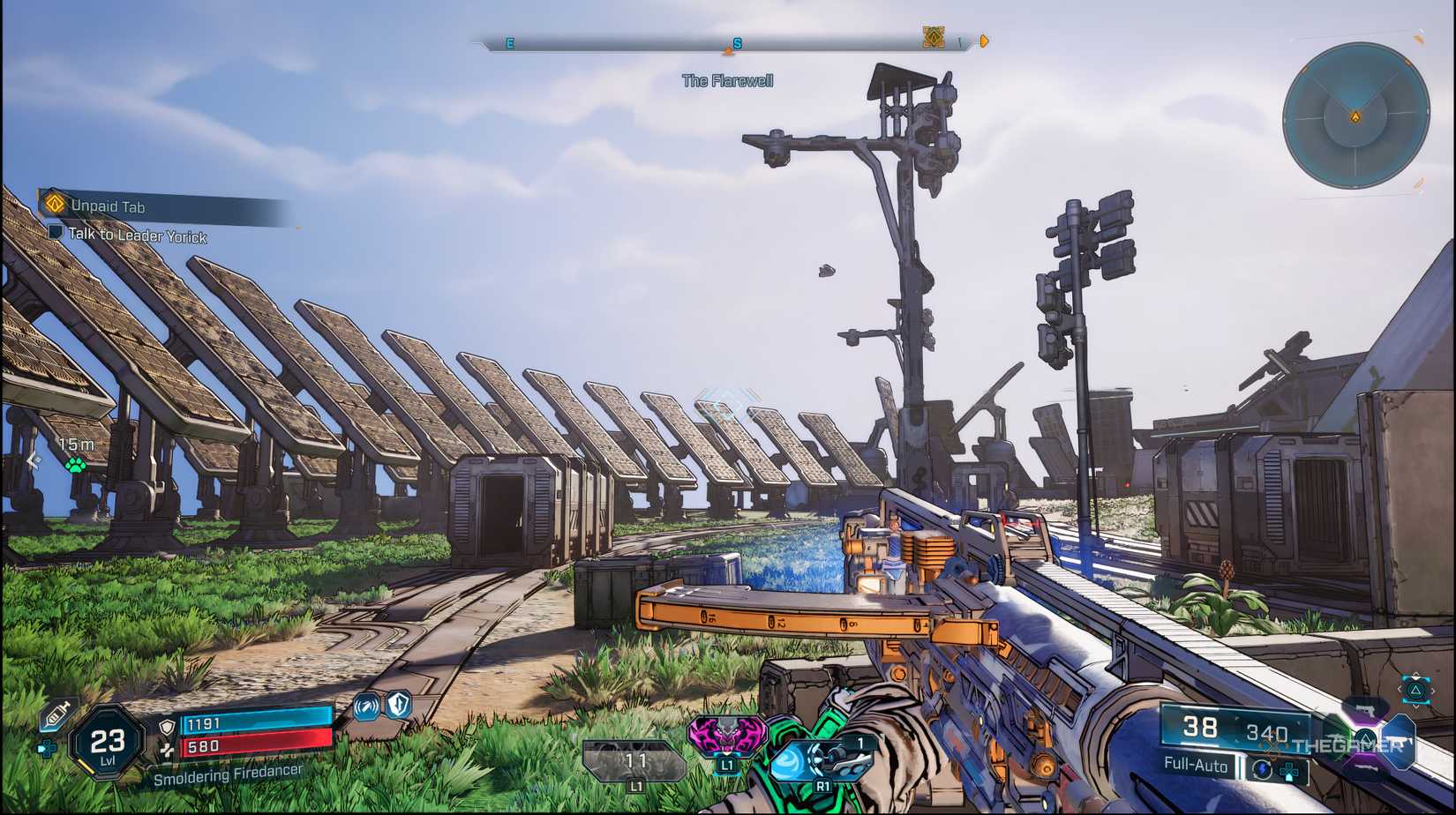 Athletes looking at a row of large solar panels in the borderlands of borderweight.