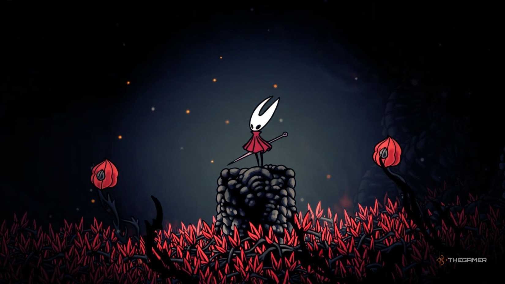 Hornet standing next to Hollow Knight: Silksong.