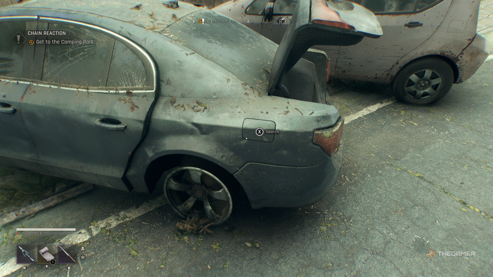 Looting fuel from a car in dying light: the beast.