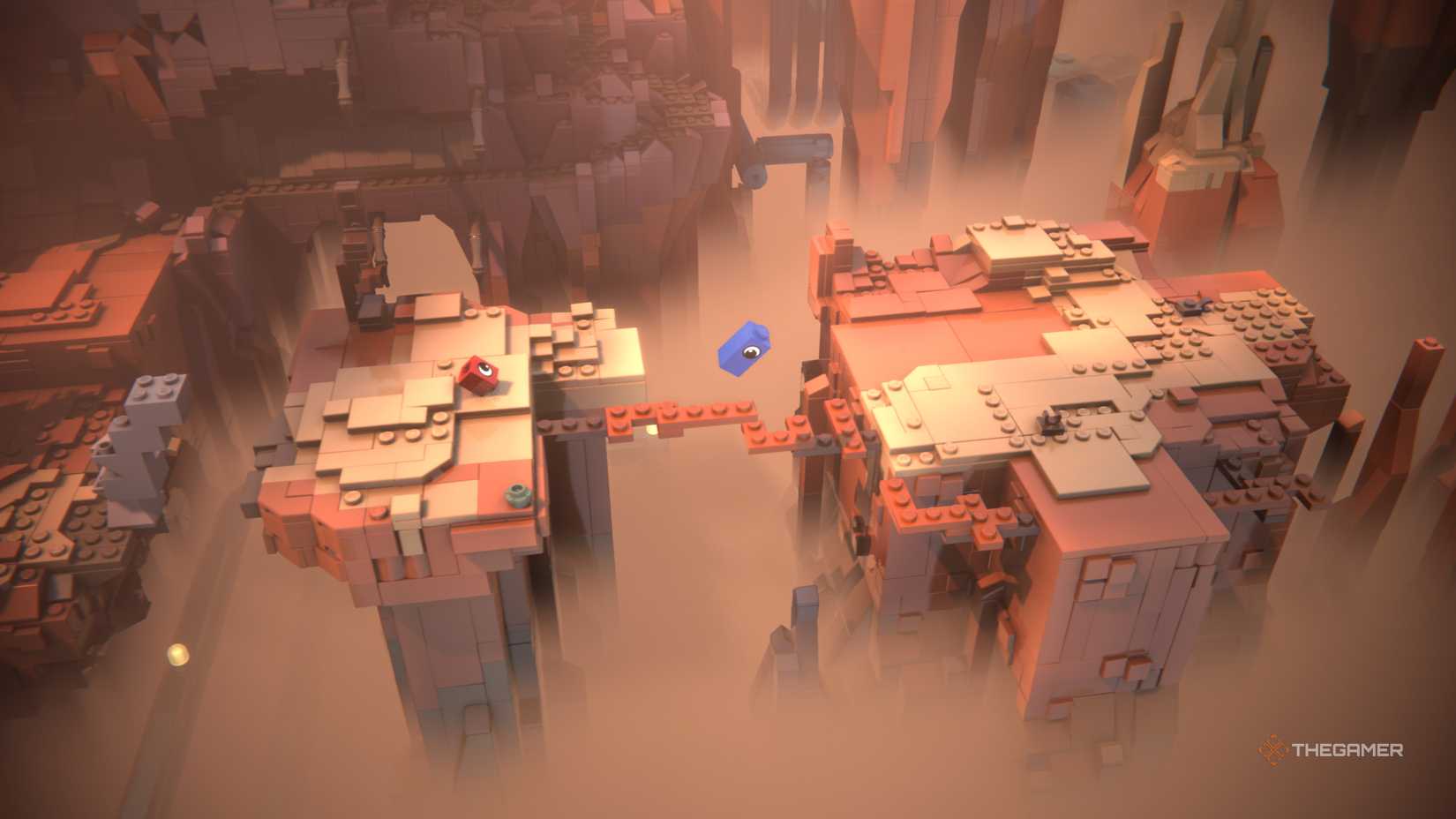 The bricks jump over the gap in the canyon of LEGO Voyagers.