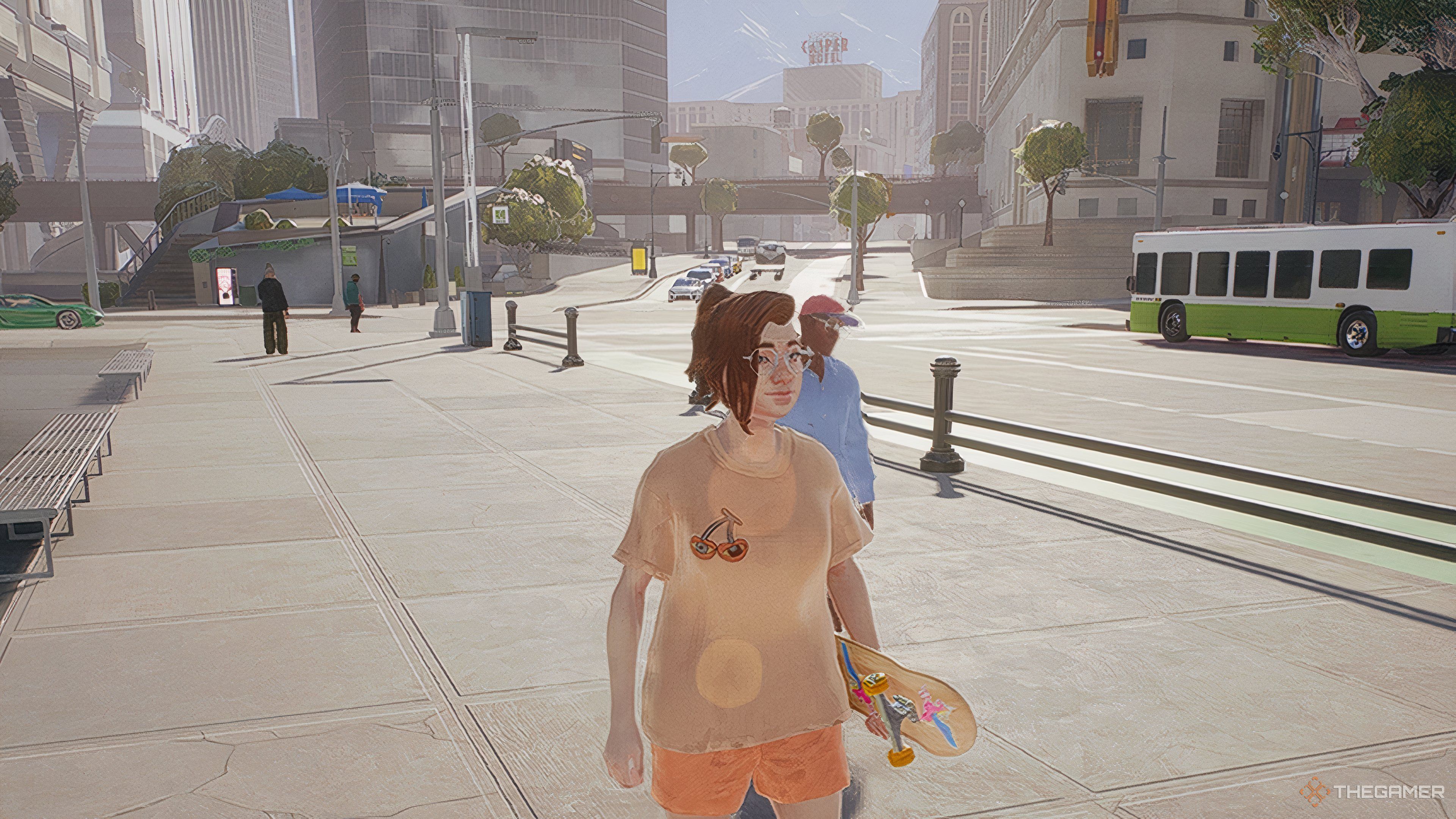 A woman in an orange shirt standing in the center of a city.
